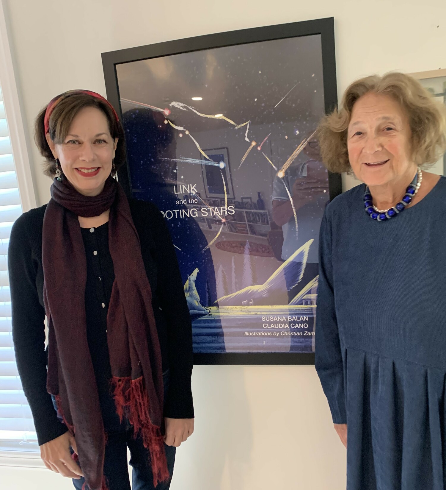 Susana Balan and Sandra Dunn with the Link poster.