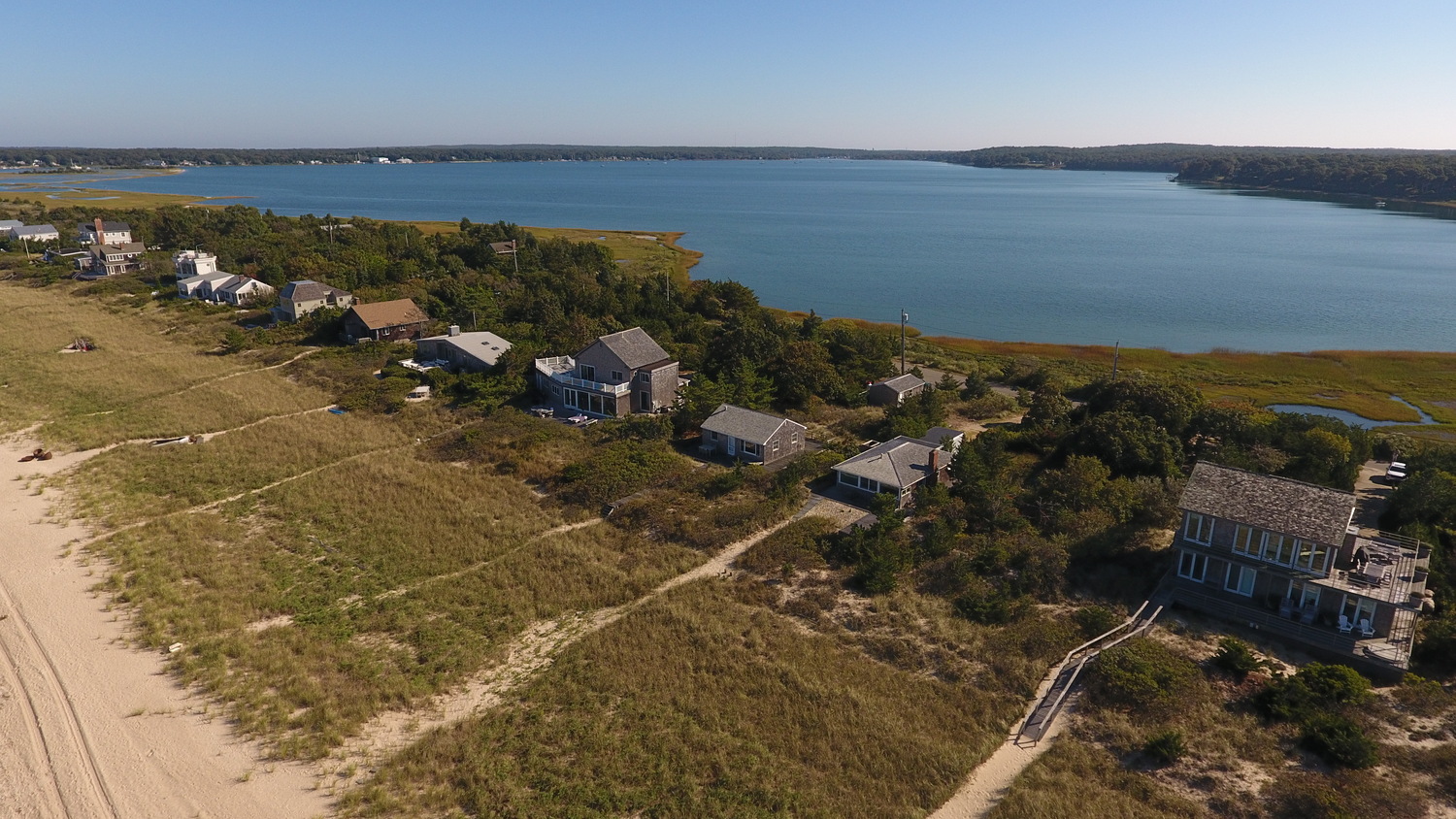 The owners of three small cottages on Sammys Beach Road have proposed razing all three and building a single new 2-story home. The proposal has outraged neighbors who say the new house is outsized for the neighborhood. 
MICHAEL WRIGHT