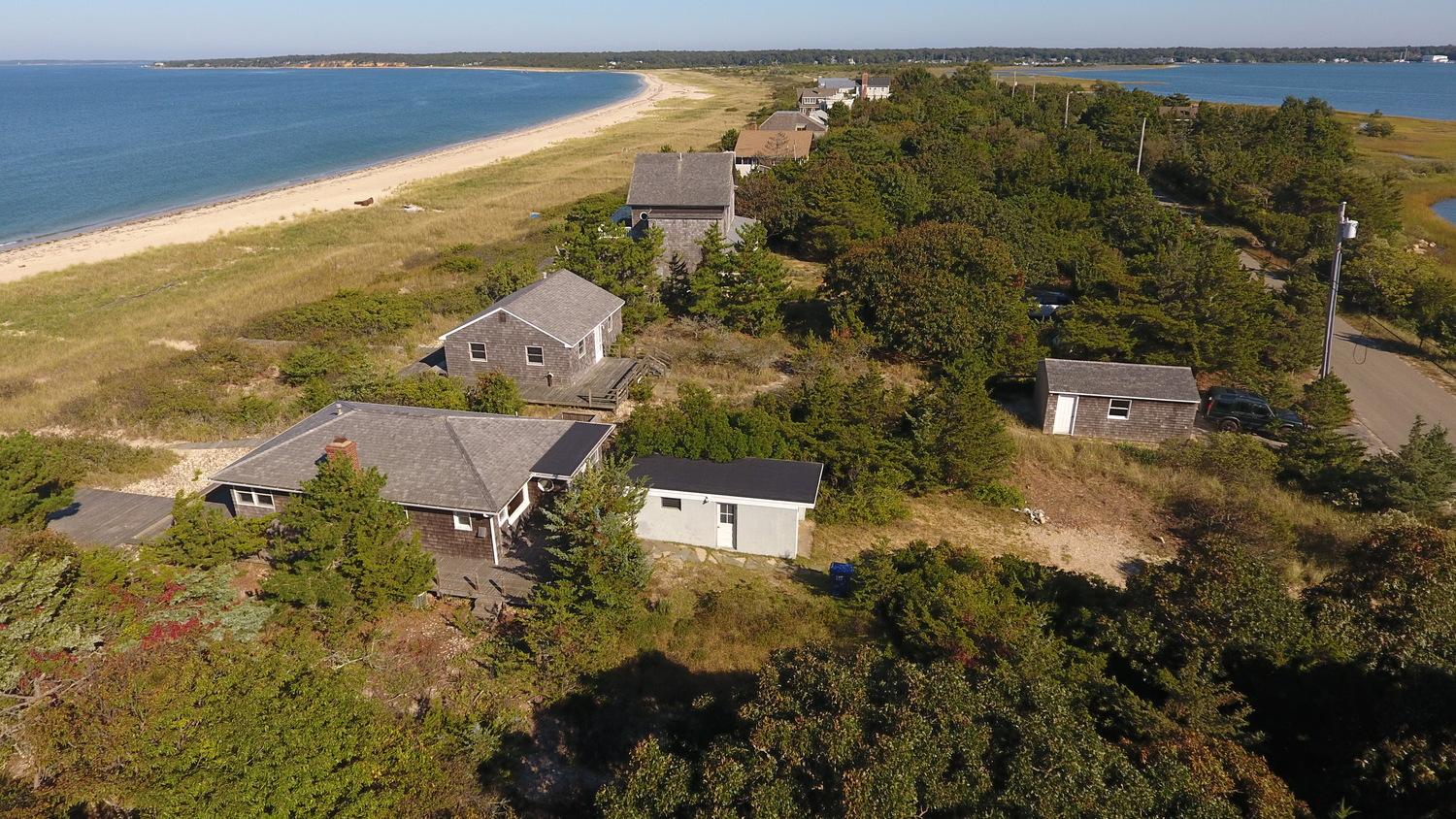 The owners of three small cottages on Sammys Beach Road have proposed razing all three and building a single new 2-story home. The proposal has outraged neighbors who say the new house is outsized for the neighborhood. 
MICHAEL WRIGHT