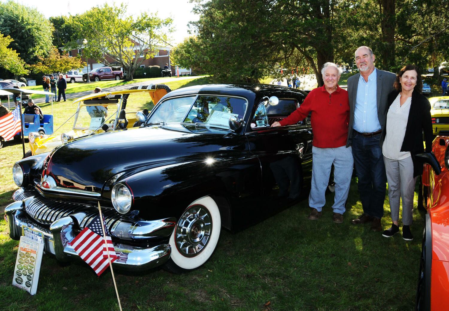 Arthur French with his 1951 Mercury 2-Door Model 78 Coupe and East Hampton Town Supervisor Peter Van Scoyoc and Marilyn Van Scoyoc at the Tyler Valich Memorial Car Show. Richard Lewin photo