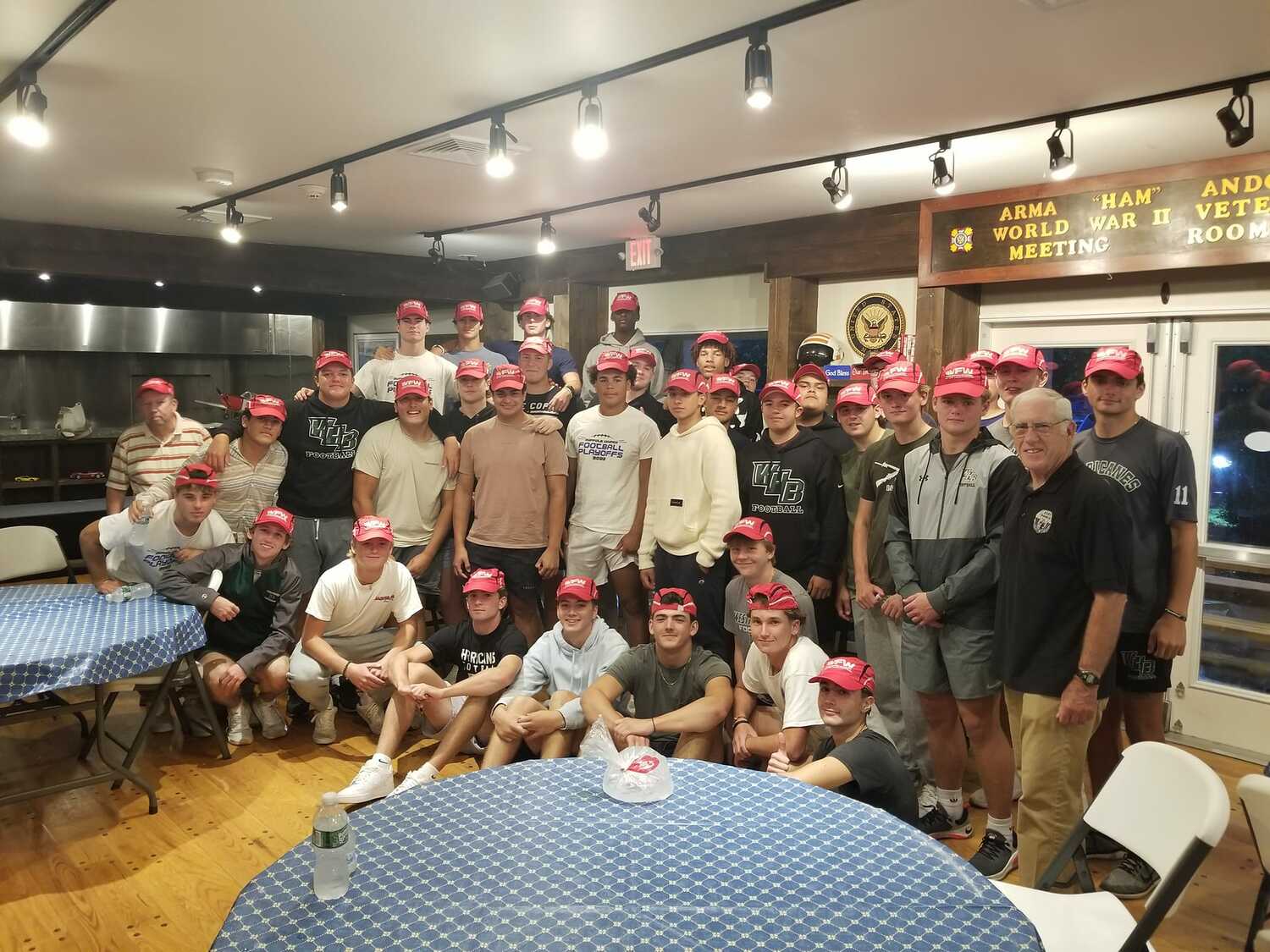 On October 5, the Westhampton Beach Football Team had a team dinner at Veterans of Foreign Wars Post 5350.  Pictured with the team is (far left) Post Quartermaster Tom Quinn and (far right) Post Commander William Hughes. Courtesy VFW Post 5350