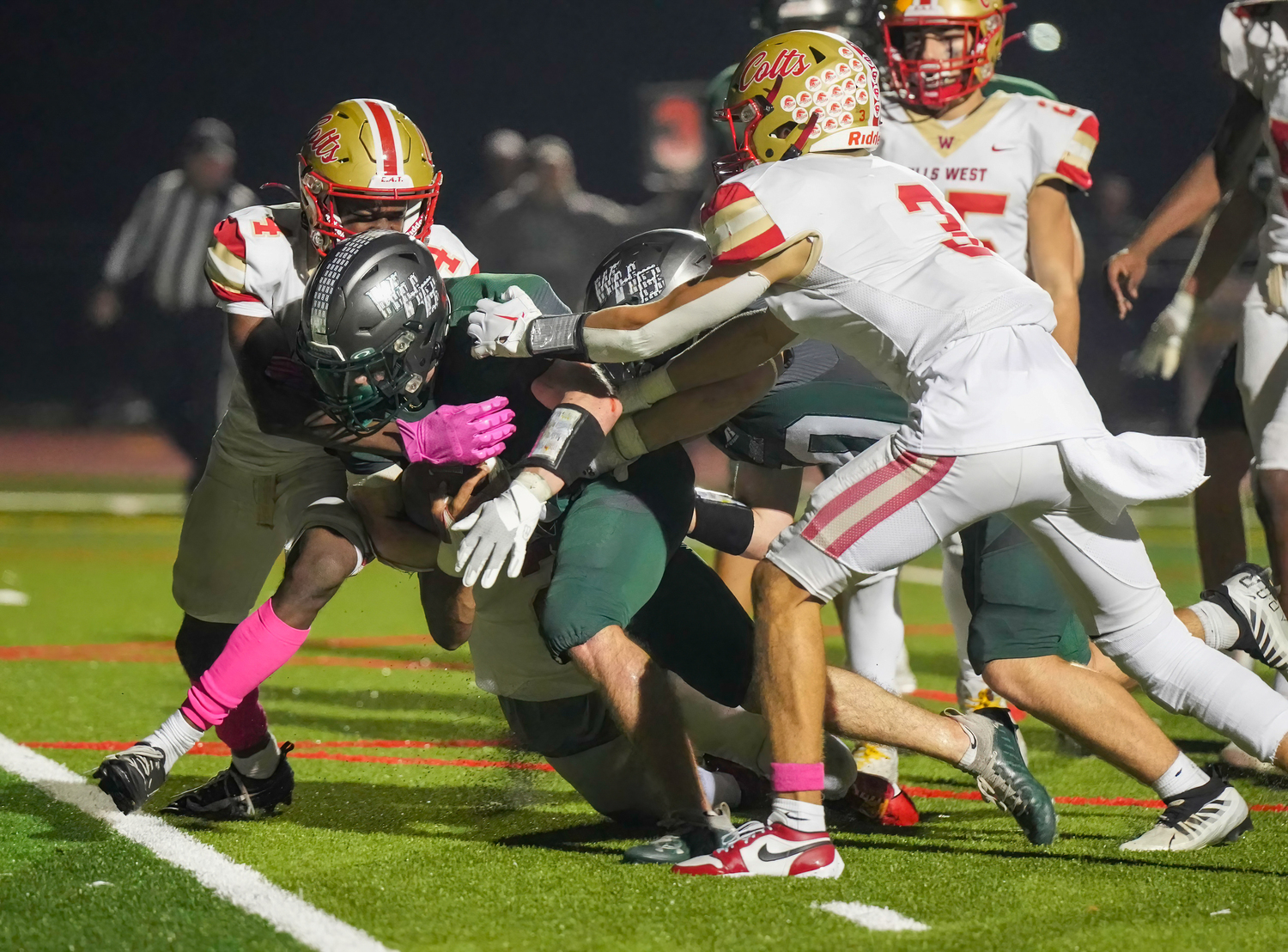 Nolan Michalowski fights to cross the goal line.   RON ESPOSITO