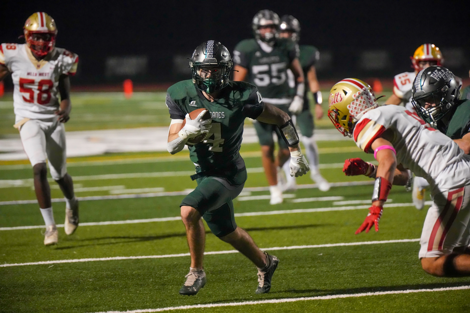 Senior  Hurricane Nolan Michalowski finds room.  RON ESPOSITO