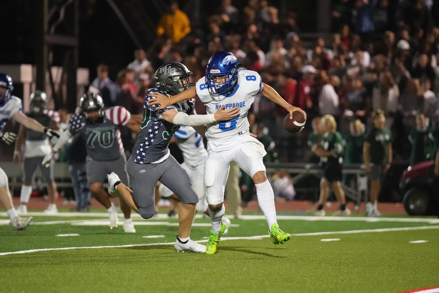 Westhampton Beach senior Matthew Hebberd gets to Hauppauge's quarterback.   RON ESPOSITO