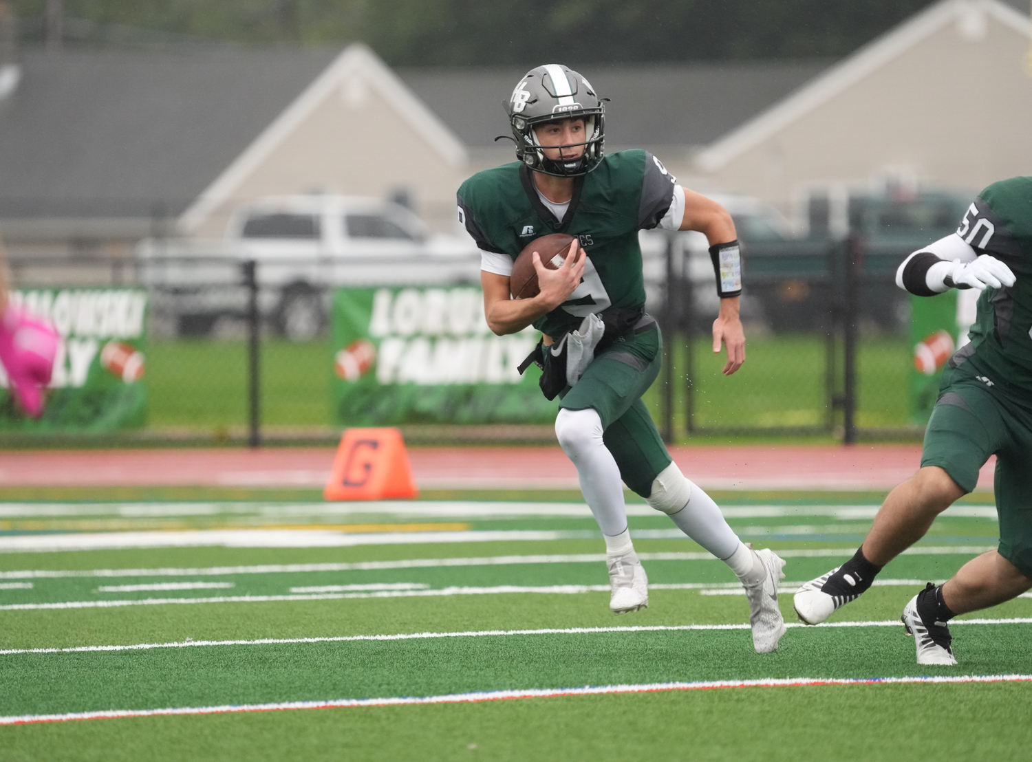 One of the few times Westhampton Beach senior quarterback Will Gambino had to ditch the pocket. He threw 10 for 14 for 152 yards and four touchdowns.   RON ESPOSITO
