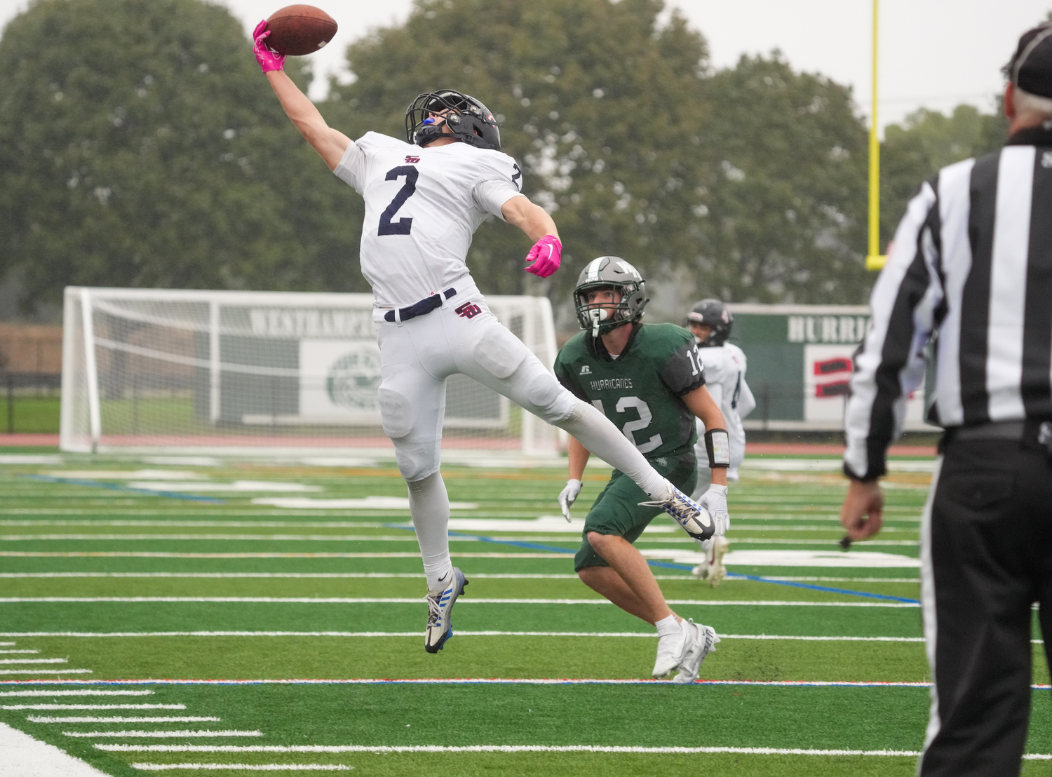 Jack Melore made a number of outstanding plays for the Smithtown West offense. He caught eight passes for 192 and scored three of the four Bulls' touchdowns.   RON ESPOSITO