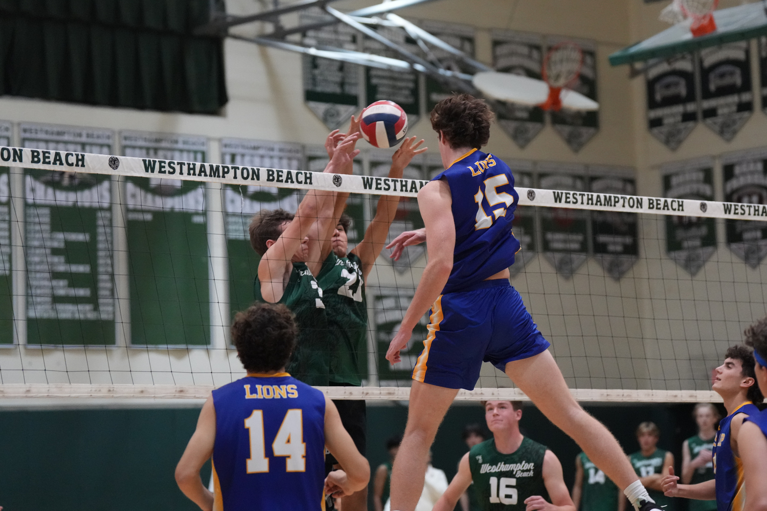 Senior setter Seth Terry and junior middle hitter James Monserrate go up for the block. RON ESPOSITO