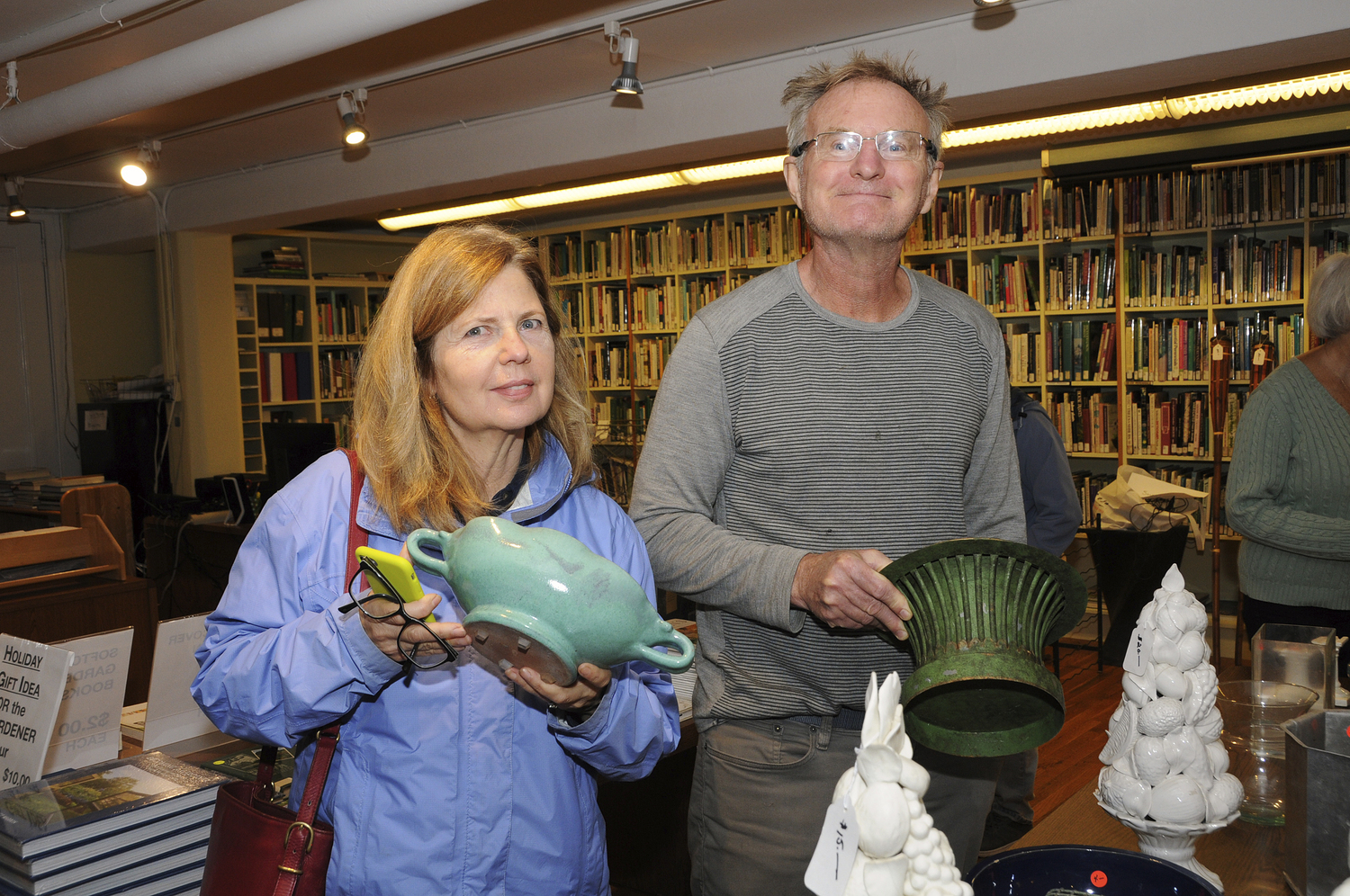 Roberta and Sam Montgomery at the Horticultural Alliance's annual yard sale at the l Alliance's John LoGerfo Library at the Bridgehampton Community House on Saturday.   RICHARD LEWIN