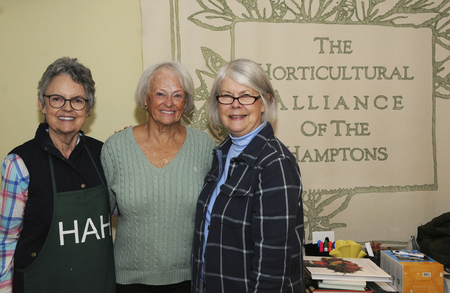 Janis Murphy, Joan DiMonda and Lydia Wallis at the Horticultural Alliance's annual yard sale at the l Alliance's John LoGerfo Library at the Bridgehampton Community House on Saturday.   RICHARD LEWIN