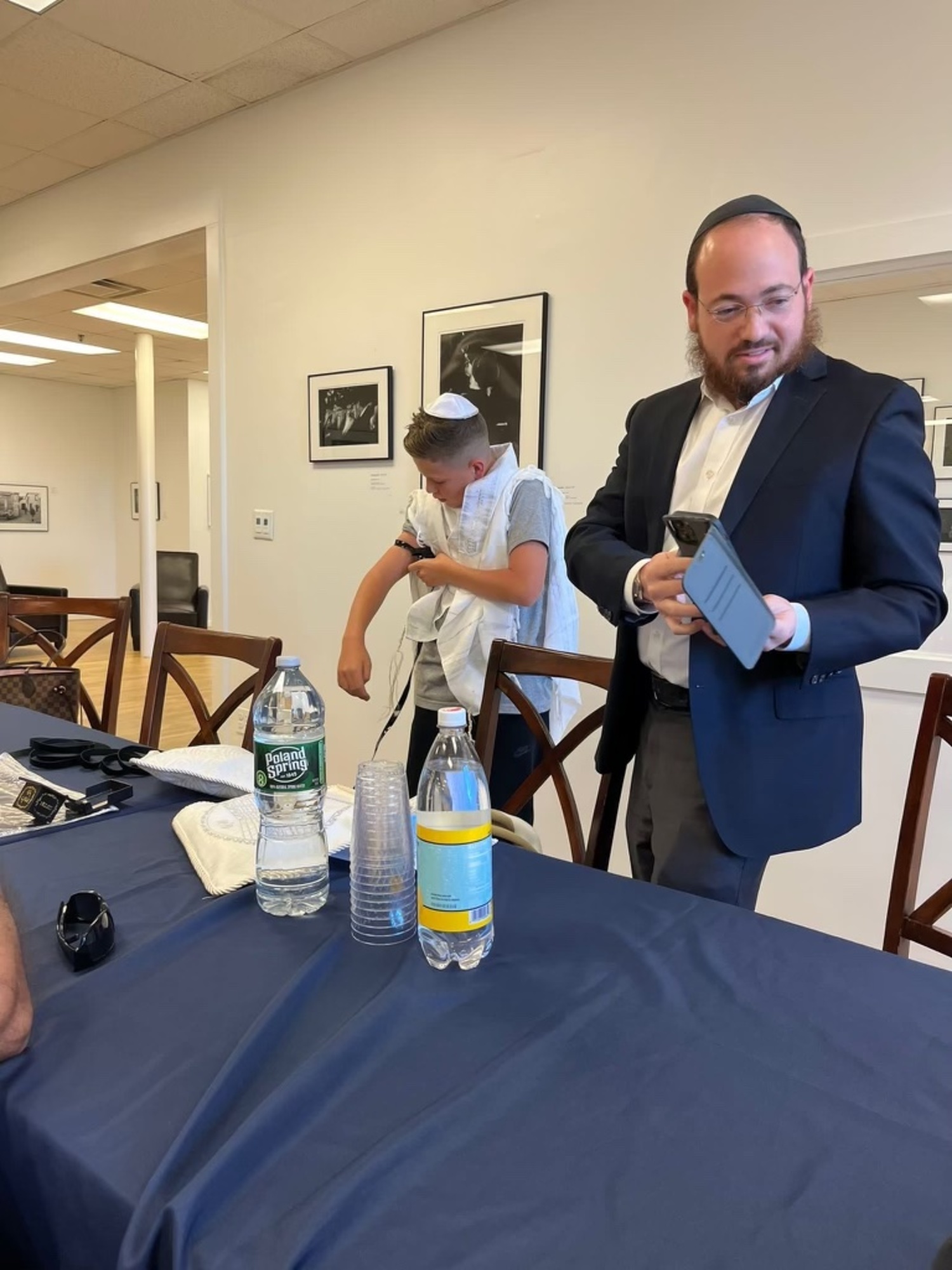 Yonatan David, displaced by the Israel-Hamas war, prepares for his bar mitzvah with Rabbi Berel Lerman at the Center for Jewish Life in Sag Harbor. COURTESY NIR SHEMESH