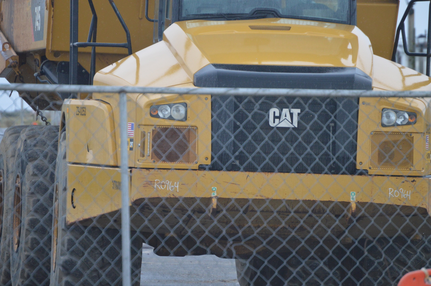 A very large dump truck is on scene at Shinnecock Inlet for ongoing sand-replenishment project.  TOM GOGOLA