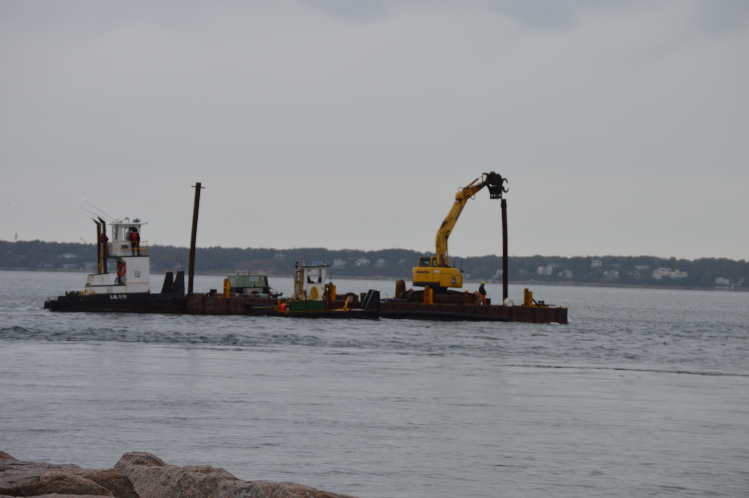 Dredging equipment on the move in Shinnecock Inlet as part of ongoing sand-replenishment project. TOM GOGOLA