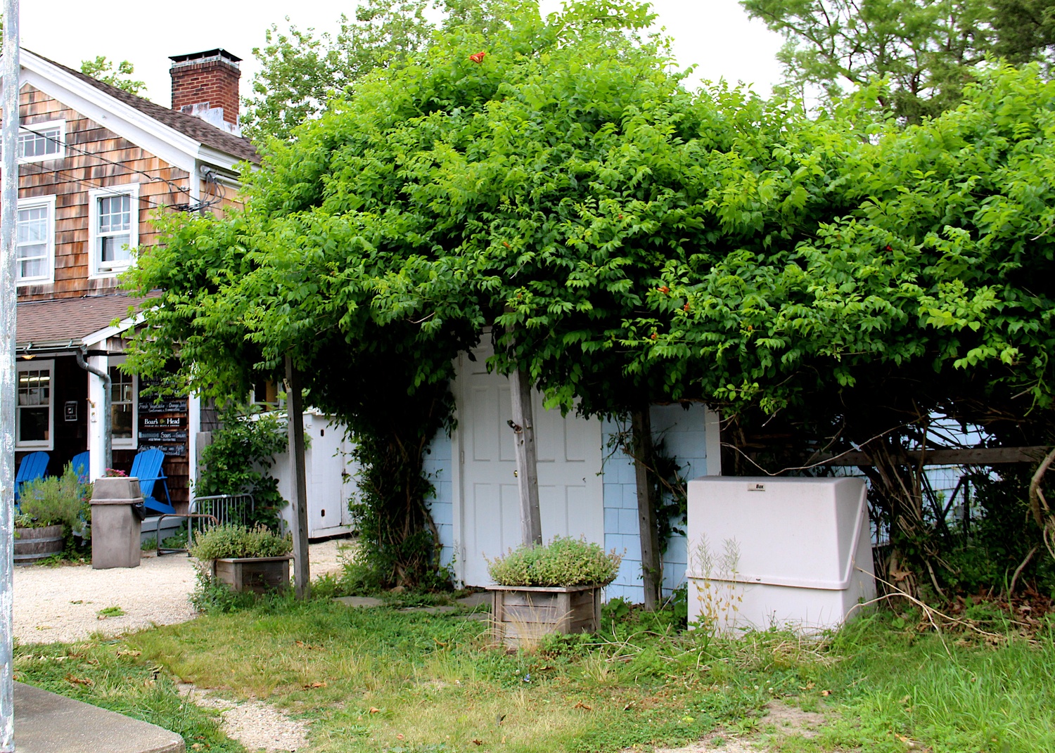 The former gas station booth has been proposed to be converted to a retail wine shop that would serve wine and beer for consumption on the general store property.
KYRIL BROMLEY