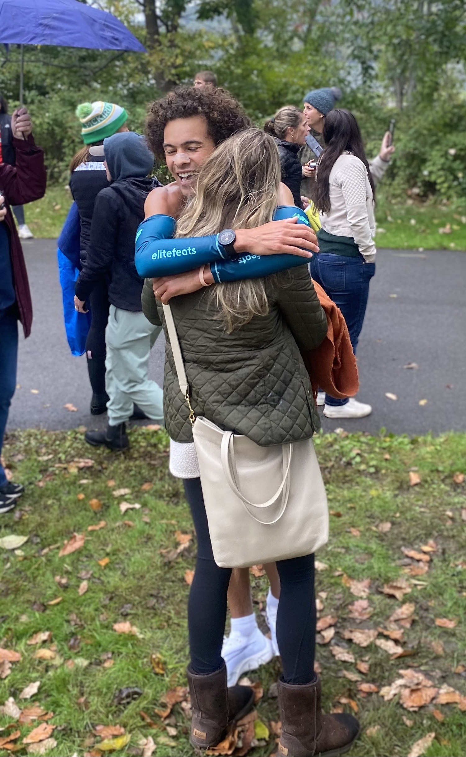 Jordan Daniel gets a hug from his wife, Crista.