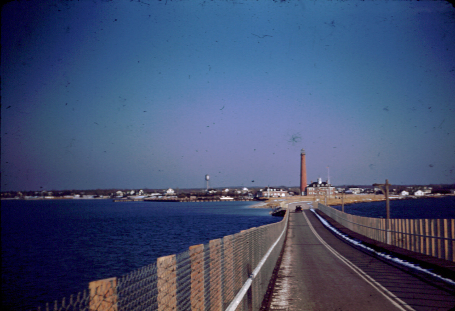 The Shinnecock Lighthouse seen from the Ponquogue Bridge just prior to its demolition in December 1938.