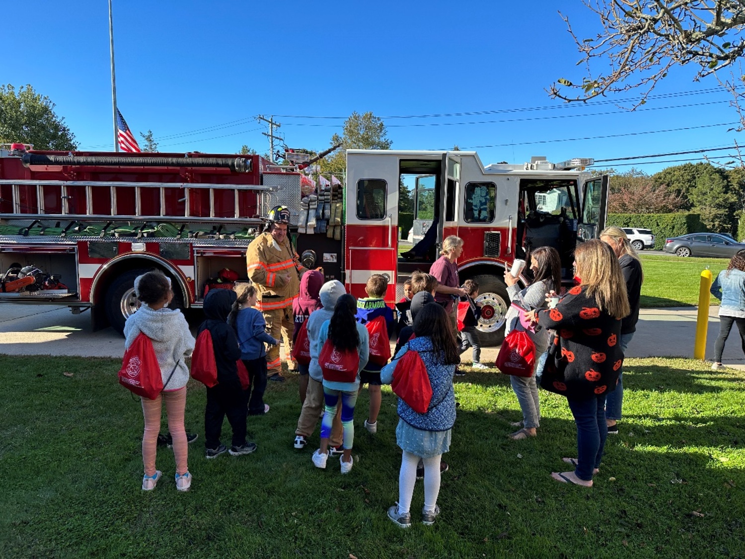 The Southampton Fire Department brought its
engines, ladder truck, and stump jumper to Tuckahoe School last week to teach the students about fire safety. Students saw the vehicles in action and learned how they are used during emergencies. A highlight of the visit was the simulated smokehouse. In this safe, controlled environment, fog is created to mimic the conditions of a real fire. Students crawled through the smokehouse under the watchful eyes of the firefighters. The experience taught the students what to do if they ever find themselves in a smoke-filled room. COURTESY TUCKAHOE SCHOOL DISTRICT