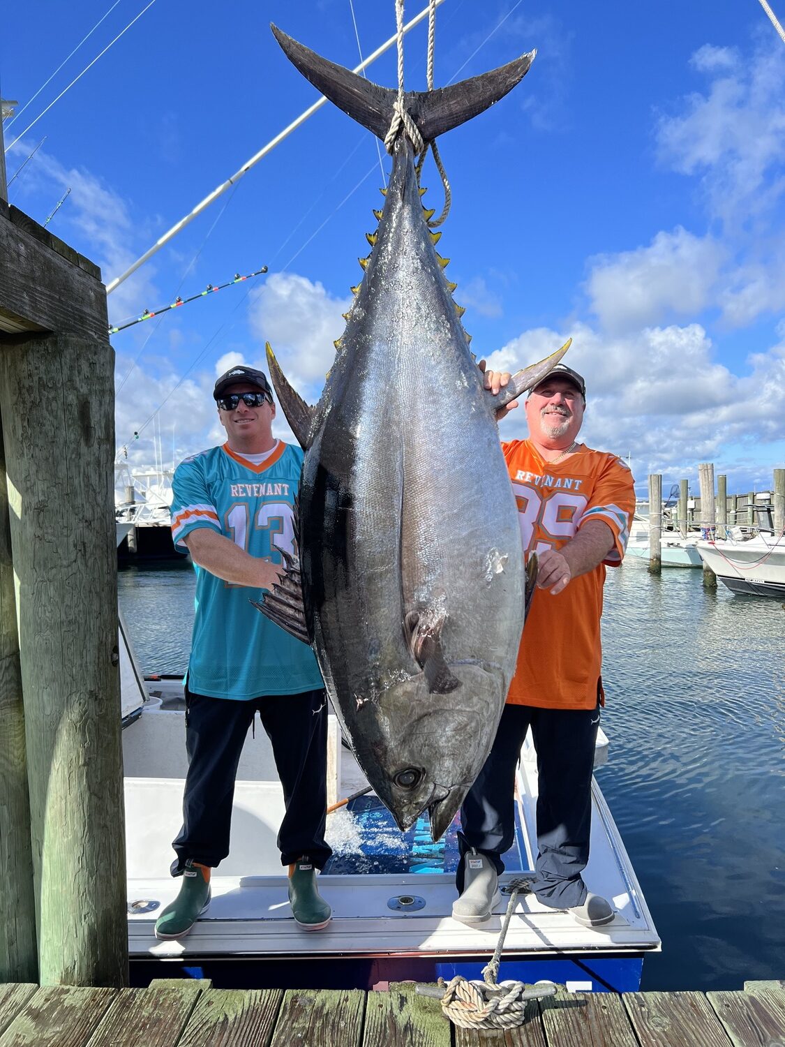 Teddy and Ted Prager with a fish of a lifetime: a 323 pound bigeye tuna. The father-son team caught the fish board their boat Revenant while fishing at Hudson Canyon and weighed it in at Oaklands Marina in Hampton Bays last month.
DAN MATTEO
