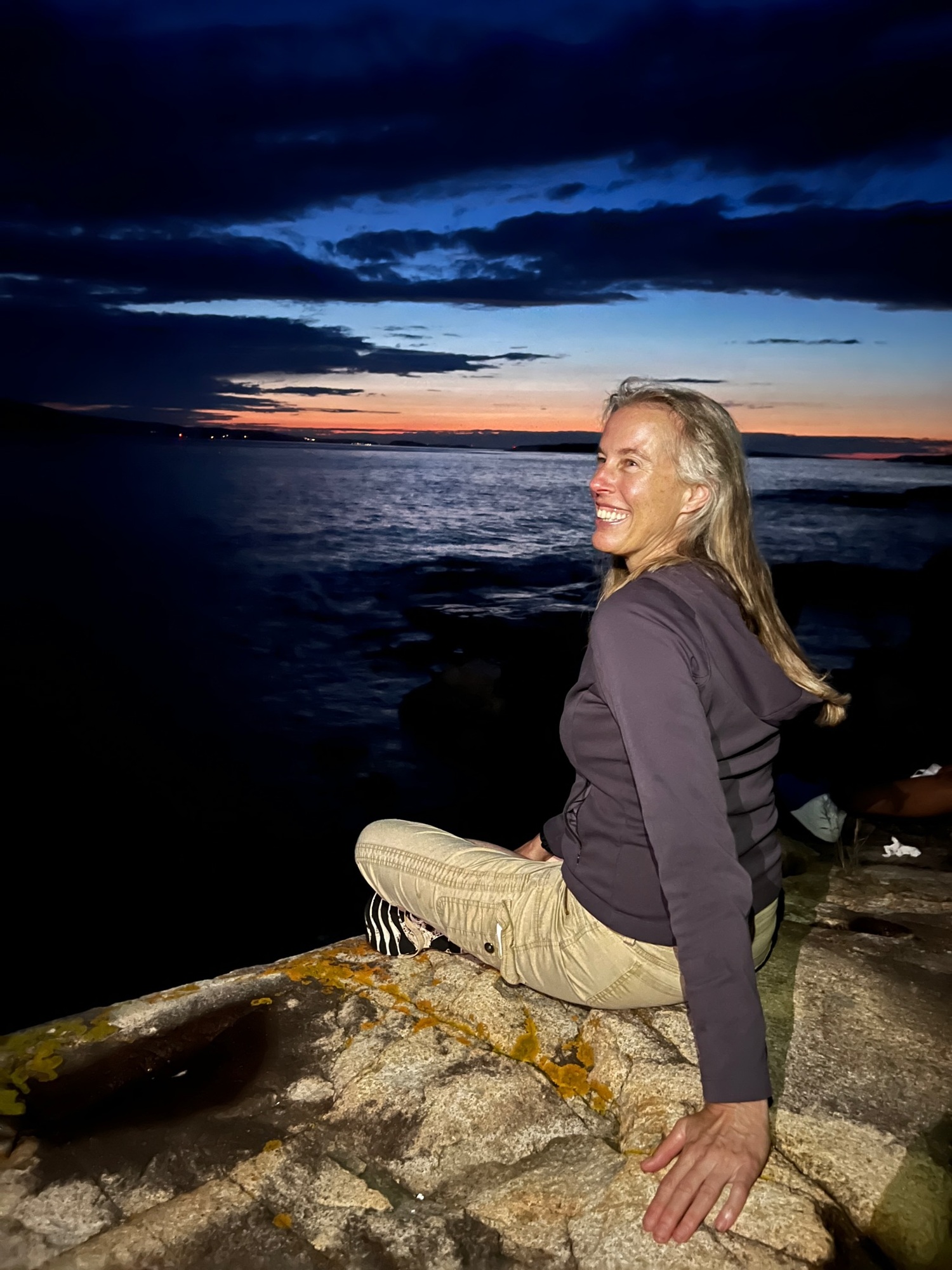 Jennifer Keller celebrates the natural environment at Acadia National Park during the MacArthur Foundation Institute on Climate and Equity. COURTESY JENNIFER KELLER