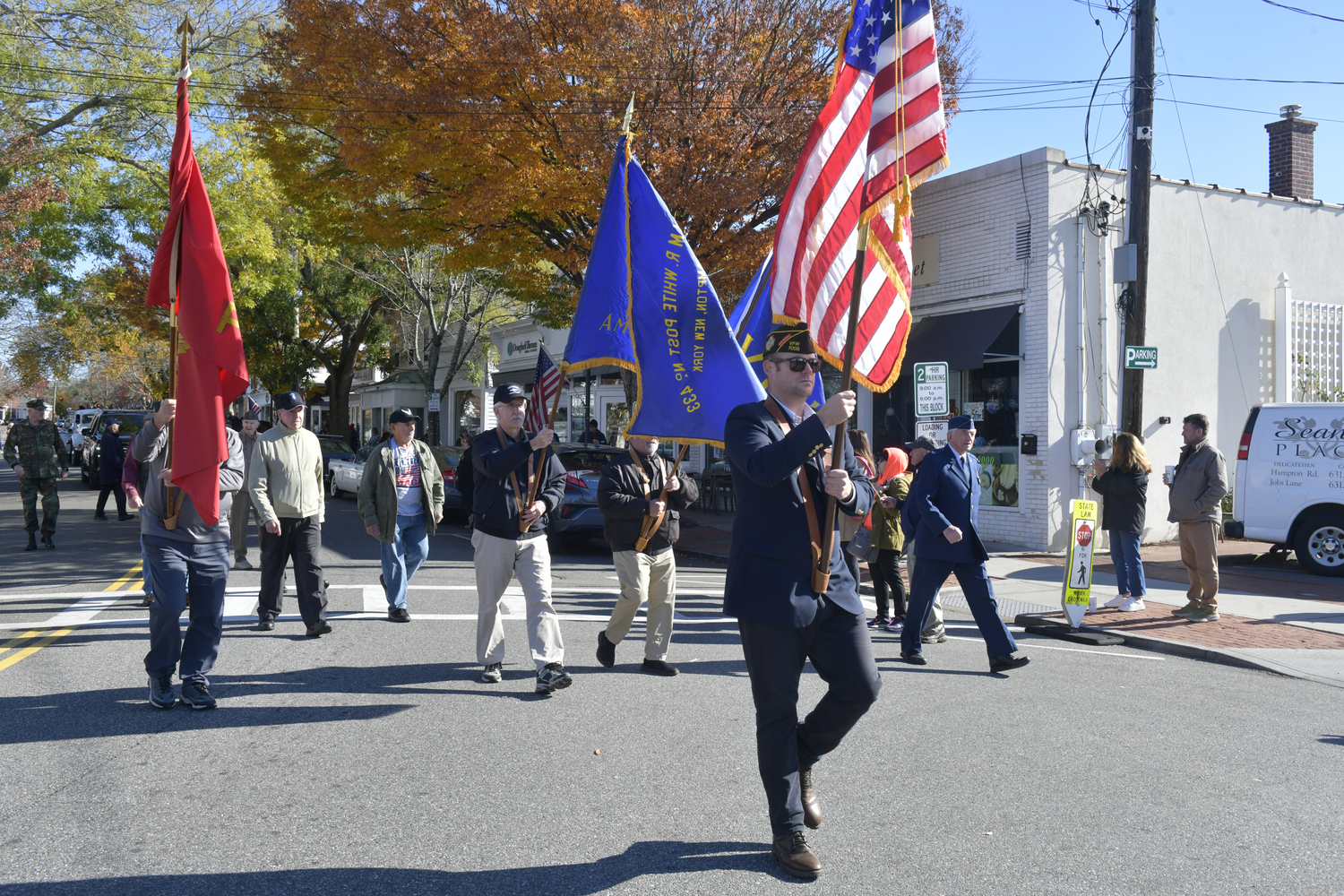 The Color Guard marches in the Veterans Day parade on Saturday.