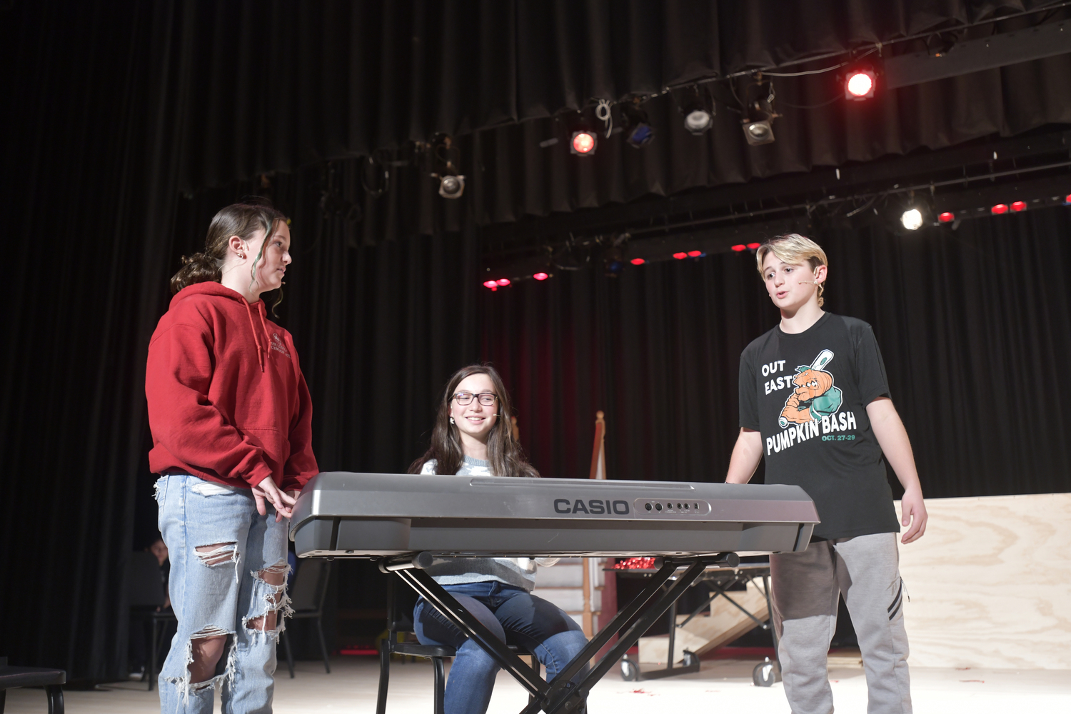 Isabella O'Leary, Annabell Abrahams and Kai Kent rehearse a scene from 