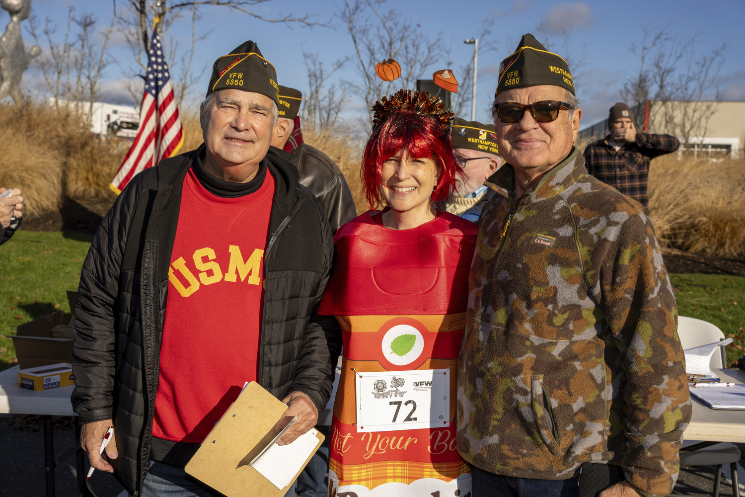 Donald Skeinert, Paula Eglivsky and Paul Eglivsky at the Westhampton Veterans of Foreign Wars seventh annual Turkey Trot at at Francis S. Gabreski Airport on Thanksgiving Day.  RON ESPOSITO