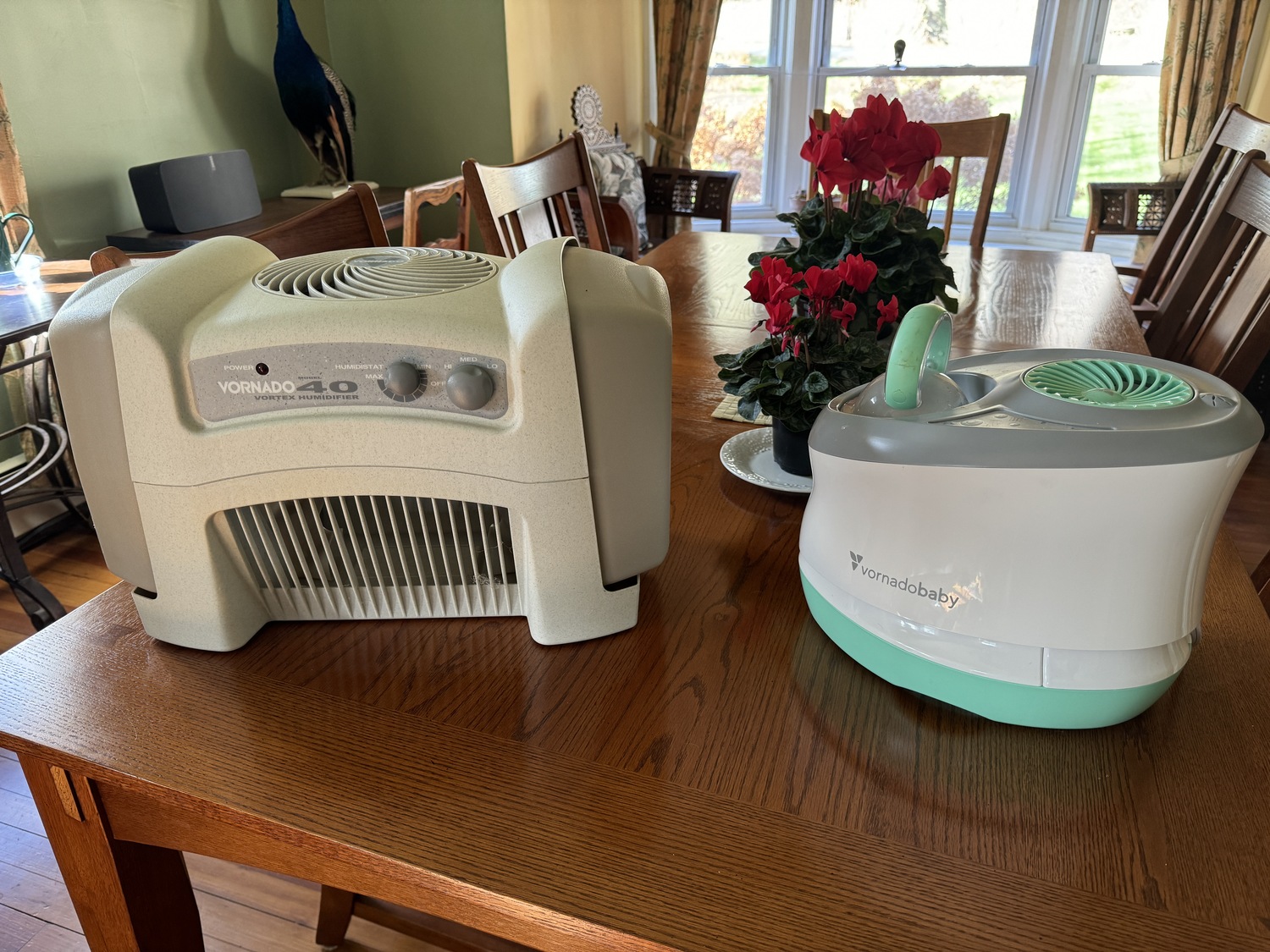 Vernado makes a great line of wick-type evaporative humidifiers. They use less electricity than other types and are easy to maintain. The Vornado 40 on the left holds 4 gallons of water, has three fan settings and it will run for at least 24 hours between refills. On the right is the Vornadobaby, which is great for smaller rooms but only has a 32-ounce tank and probably needs to be filled twice a day.
ANDREW MESSINGER