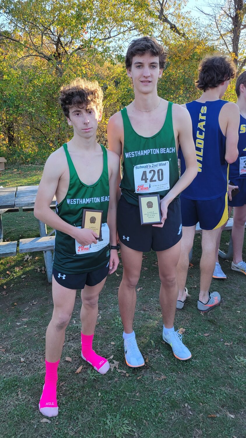 Marcus Haynia, left, and Trevor Hayes with their All-County plaques.   DREW BUDD
