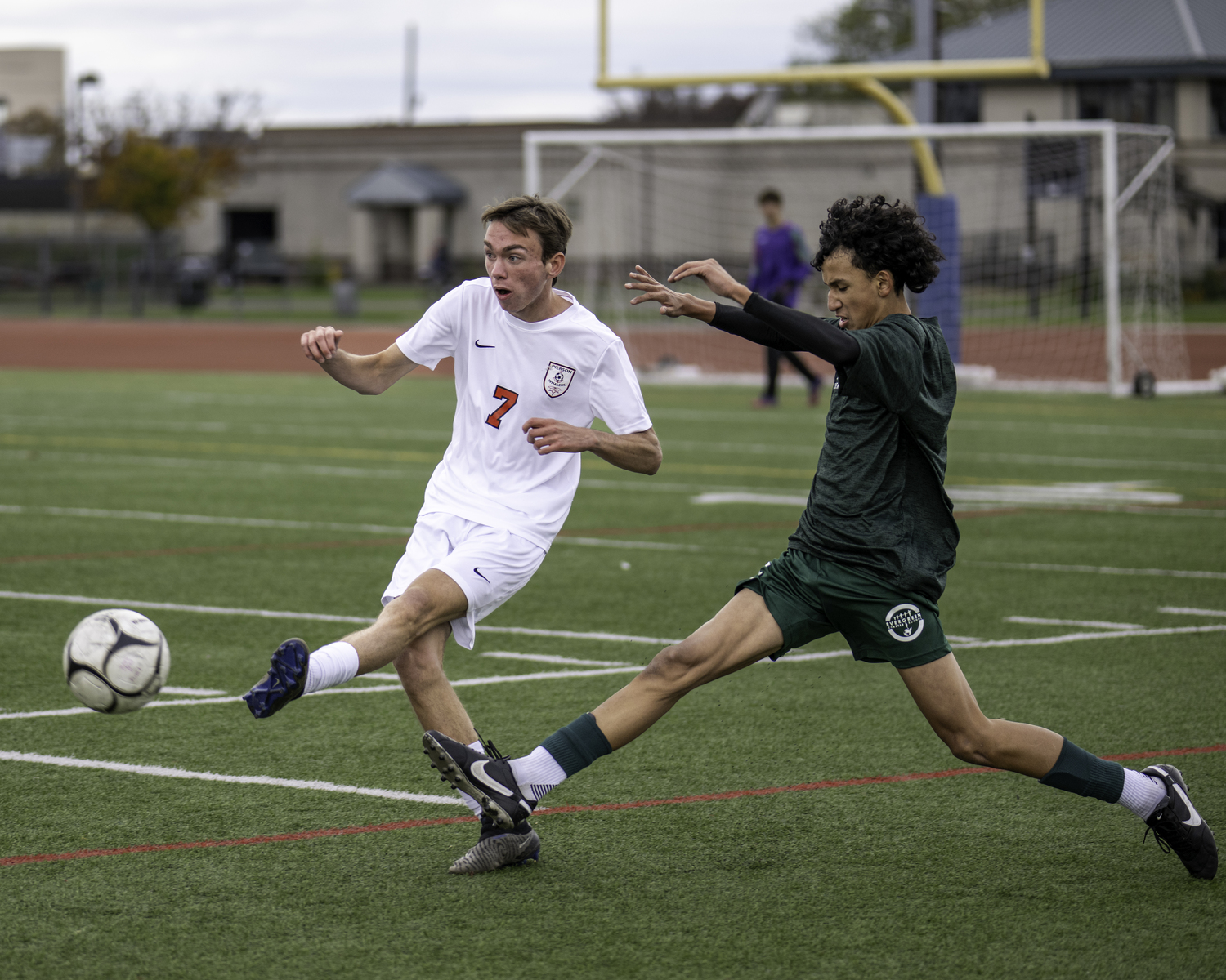 Pierson senior Ryder Esposito clears the ball before an Evergeeen Charter gets to it.  MARIANNE BARNETT