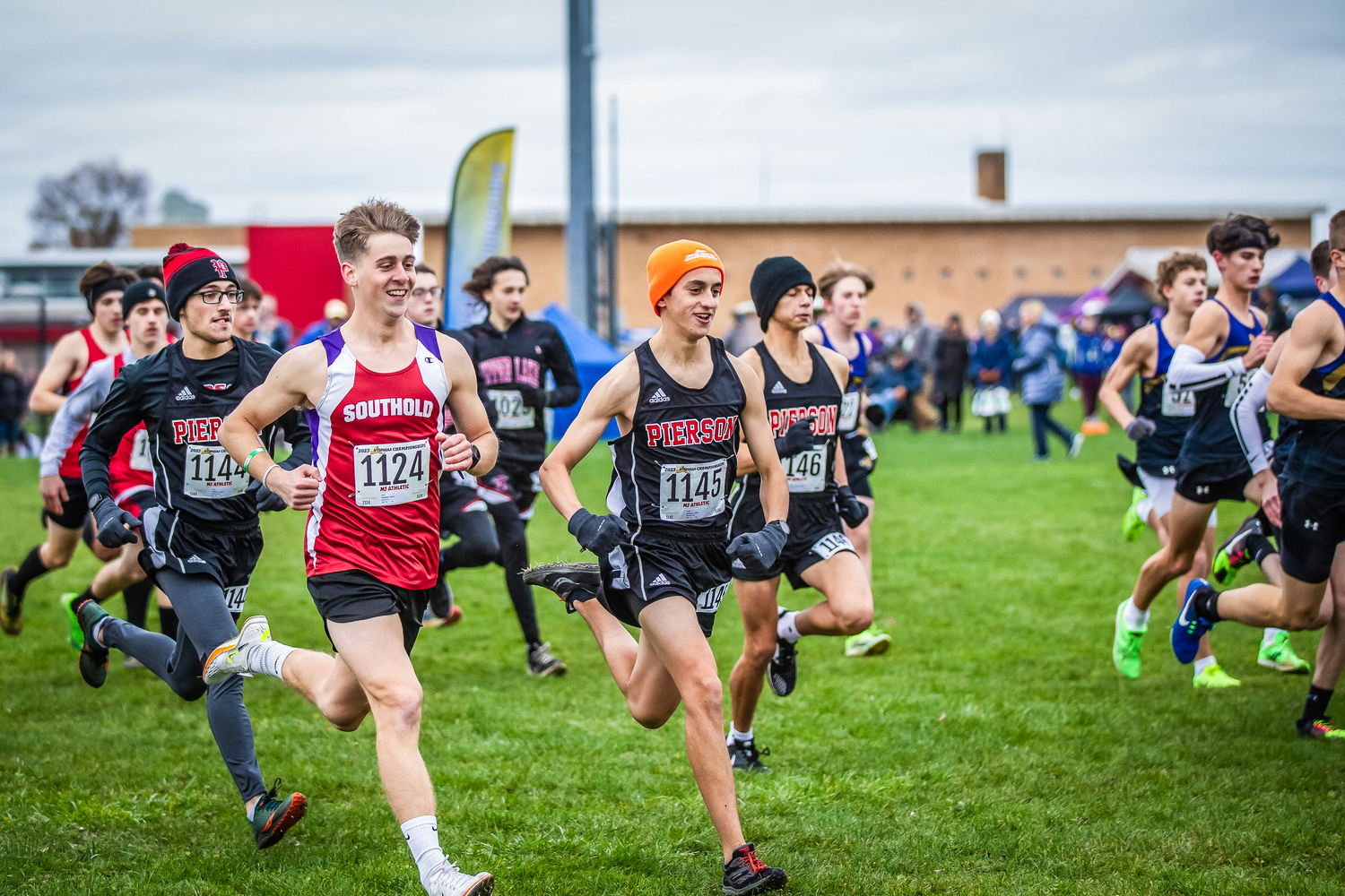 Pierson senior Justin Gardiner leads a group of Whalers out of the starting line during the cross country state championship at Vernon Verona Sherrill High School November 11.. REBECCA MCMANUS