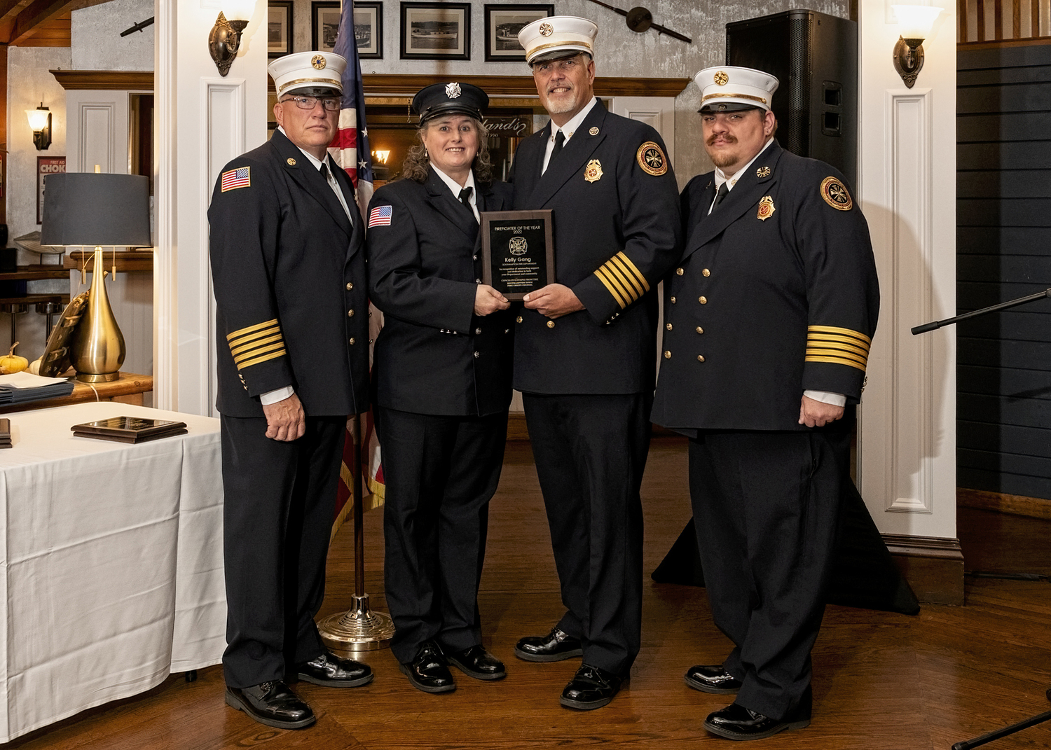 Left to right, Southampton Town Chiefs Council Secretary/Treasurer Chris Hansen, Southampton Fire Department  2022 winner Kelly Gang, Chiefs Council President and SFD Ex-Chief Roy 