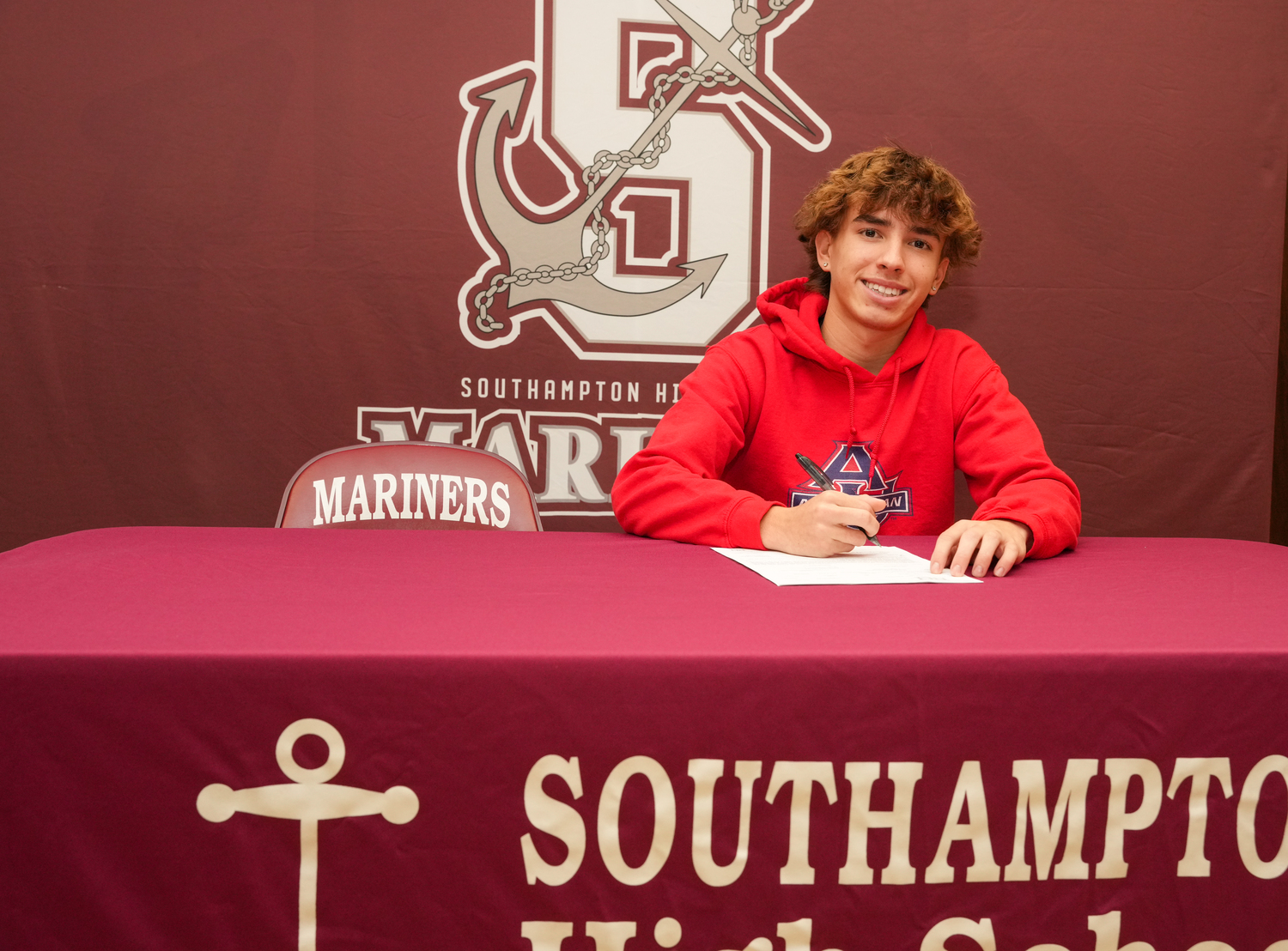 Chris Sullivan of Southampton High School signed his letter of intent to play soccer at American University last week. RON ESPOSITO