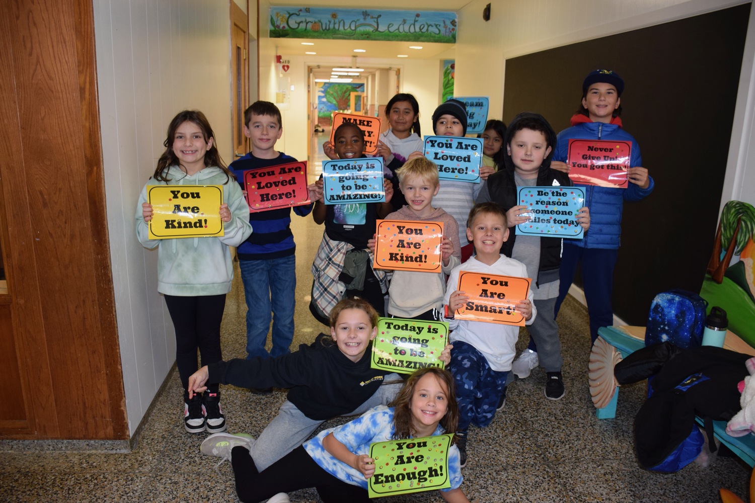 Students at Westhampton Beach Elementary School recently celebrated a week of kindness with a variety of activities. They had discussions in their classrooms about the importance of being kind to others, used chalk to write kindness messages outside their school and wrote kind letters to teachers and staff. COURTESY WESTHAMPTON BEACH SCHOOL DISTRICT