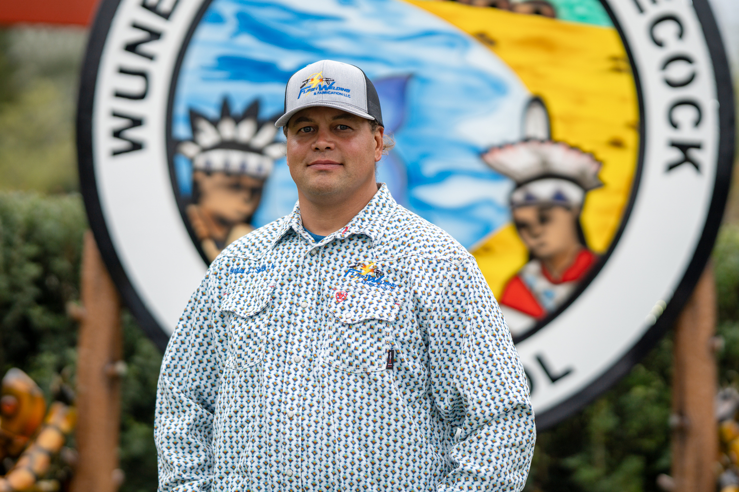 Gordon Smith recently installed a new sign that he made for the Wuneechanunk Shinnecock Preschool. REBEKAH WISE