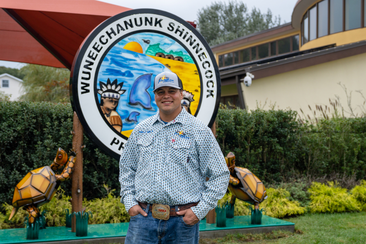 Gordon Smith recently installed a new sign that he made for the Wuneechanunk Shinnecock Preschool. REBEKAH WISE