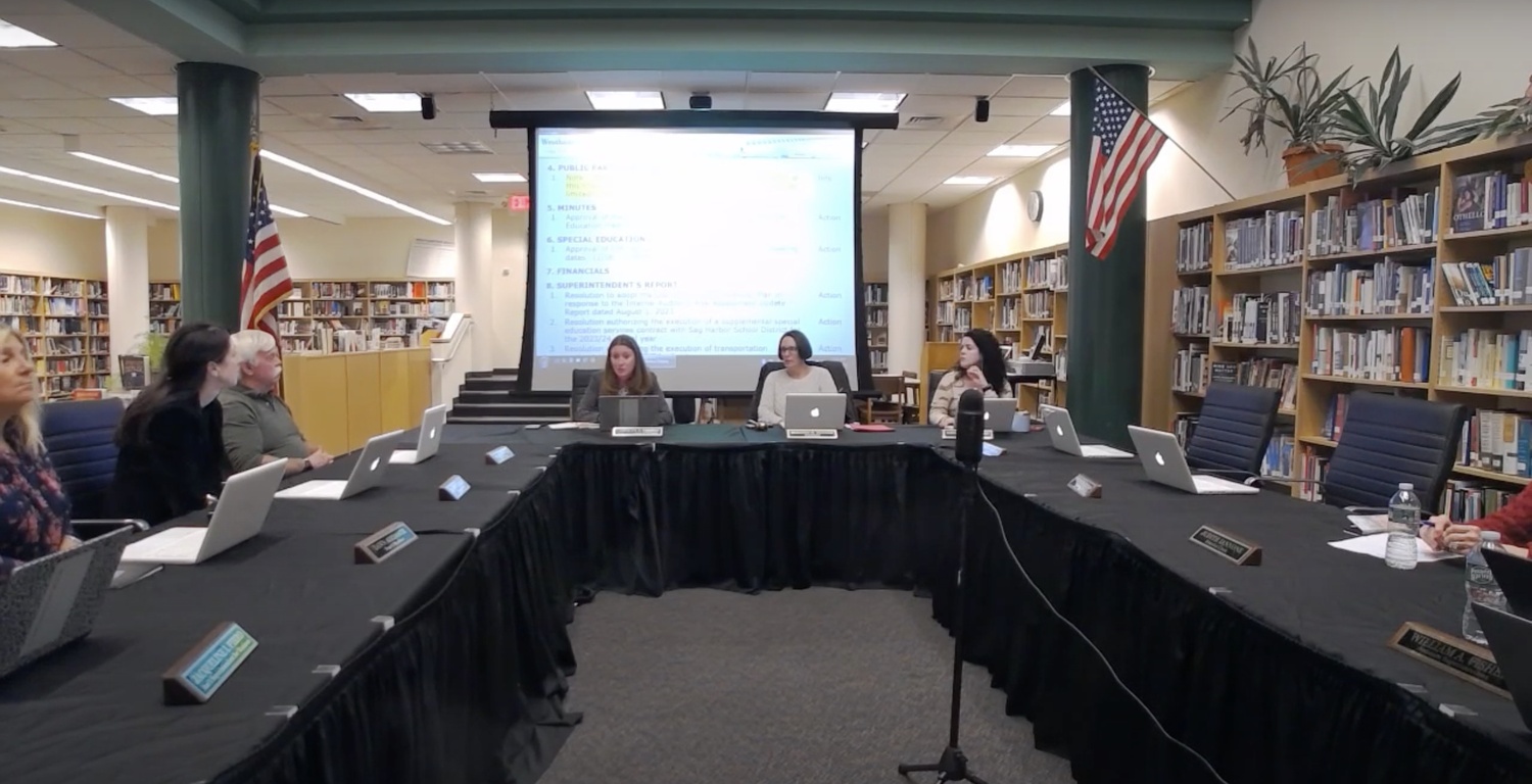 Westhampton Beach Superintendent Dr. Carolyn Probst and Board of Education President Suzanne Mensch, at center, respond to comments about bringing back a district Booster Club.