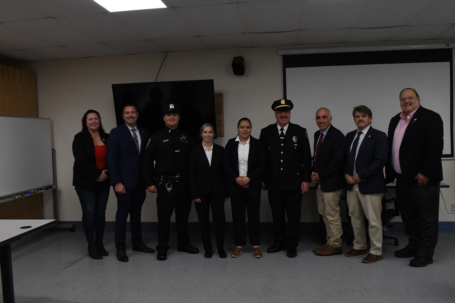 Councilwoman Cyndi McNamara, Det. Kevin Phillips, Police Officer Blake Gifford, Police Officer Ivana Hajok, Police Officer Maura Torres, Captain Howard Kalb, Supervisor Jay Schneiderman, Councilman Tommy John Schiavoni and Councilman Rick Martel.