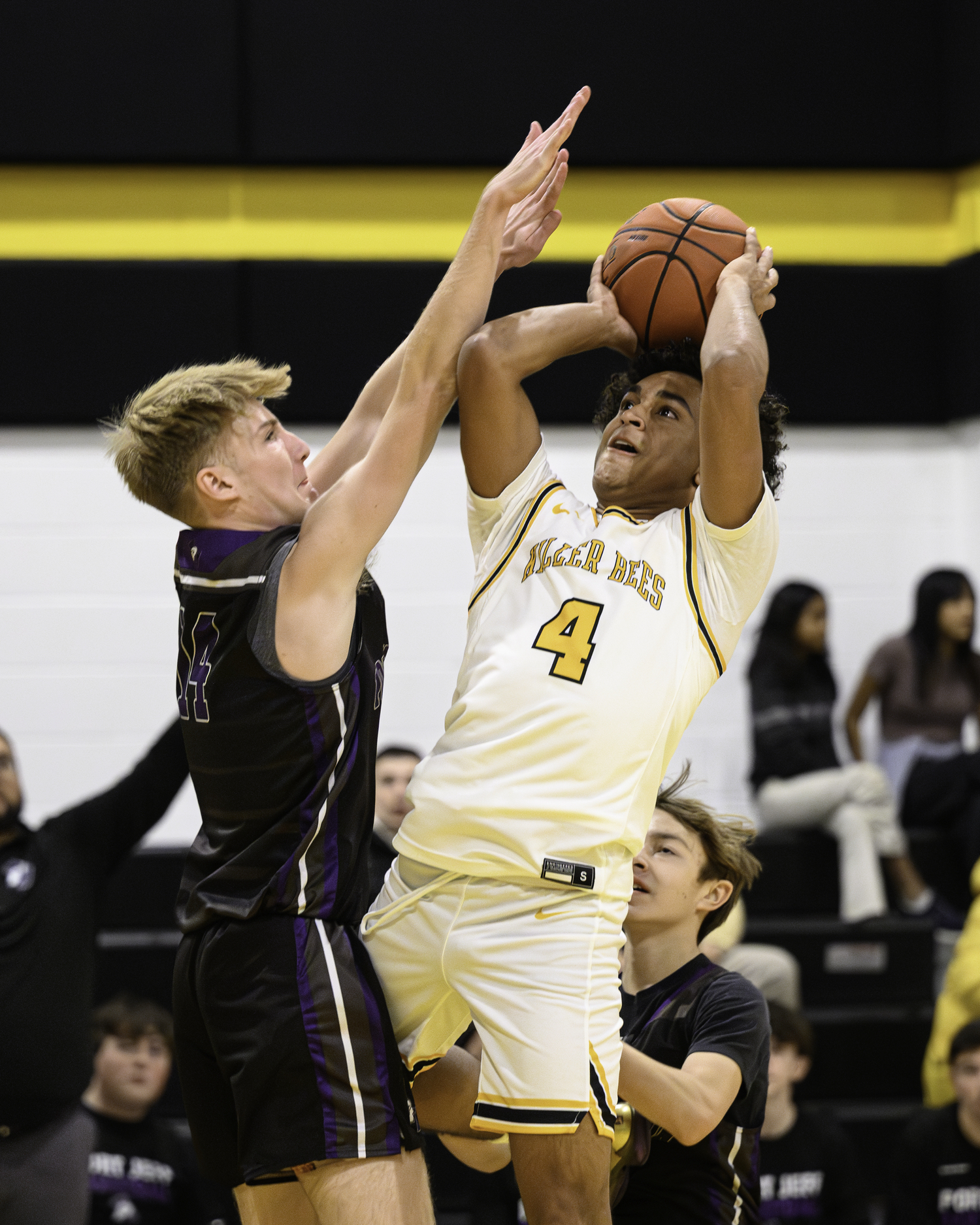 Bridgehampton sophomore Alex Davis attempts to shoot over Port Jefferson's Tyler Cobb.   MARIANNE BARNETT