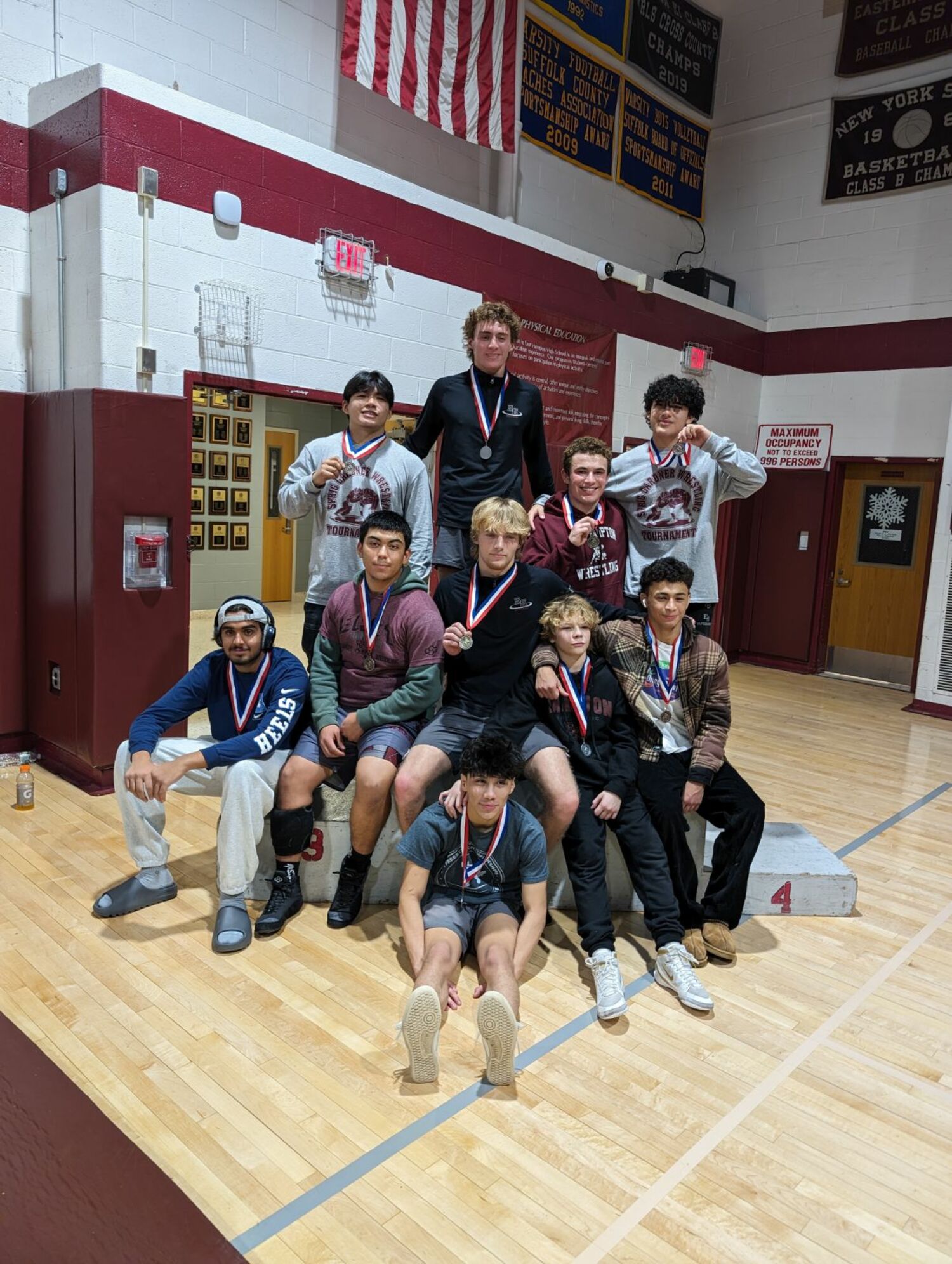 The Bonackers had a number of placewinners at its host tournament on Saturday, led by Adam Beckwith, center, who was named Most Outstanding Wrestler.