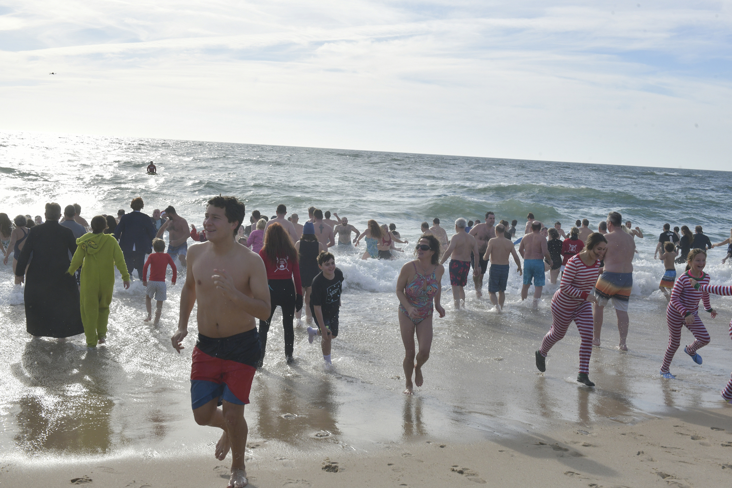 Plungers exit the ocean.