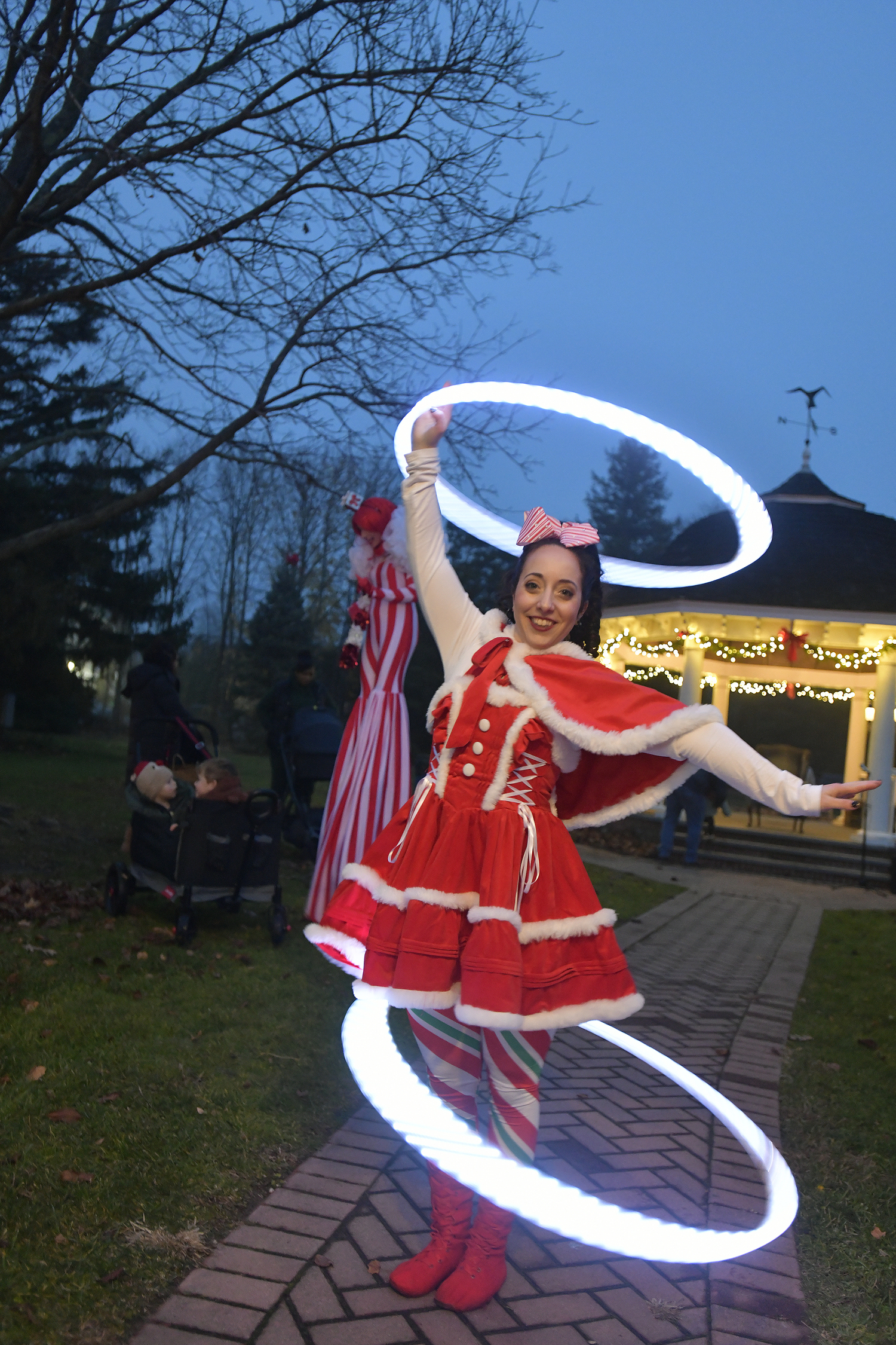 Emily Gandolfo welcomes visitors to the Westhampton Beach Village Green on Saturday evening.
