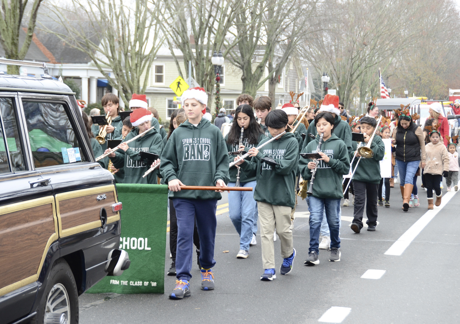 The Springs School Band performs during the Santa Parade in East Hampton on Saturday.