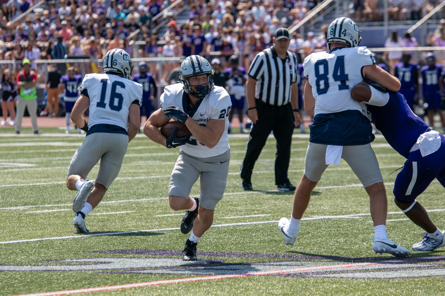In the 2023 season-opener at Stonehill College, University of New Hampshire senior running back Dylan Laube had a 58-yard punt return touchdown, 23-yard receiving touchdown and 11-yard rushing touchdown all in the first quarter. UNIVERSITY OF NEW HAMPSHIRE ATHLETICS