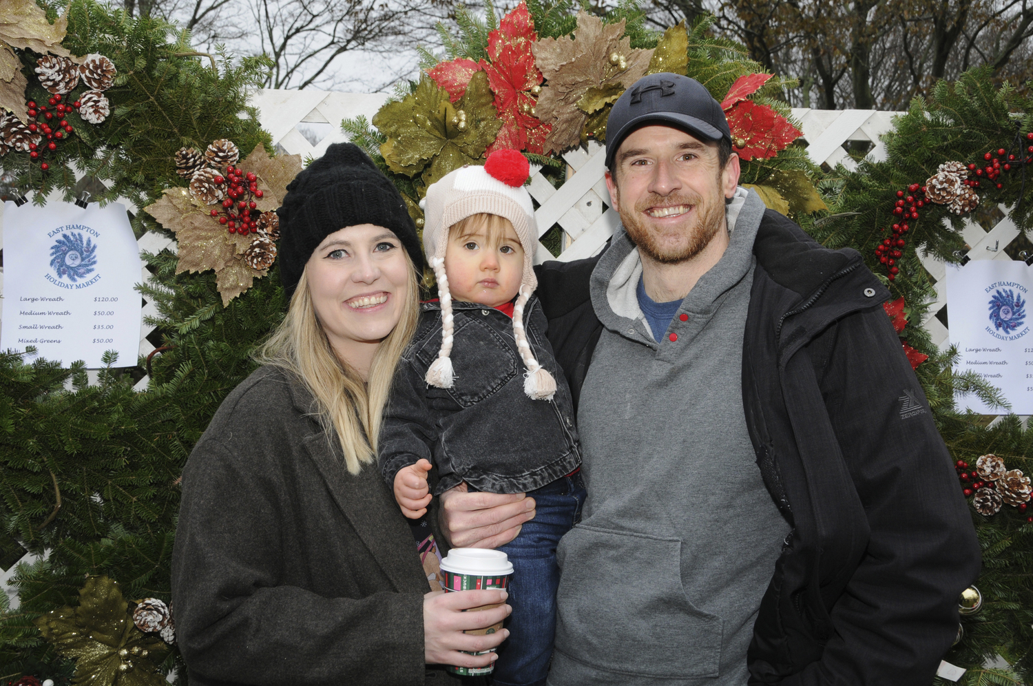 Meaghan Forrestal, Cormac Cummings and Neil Cummings at the first ever Holiday Market at East Hampton Village Hall on Saturday.  RICHARD LEWIN