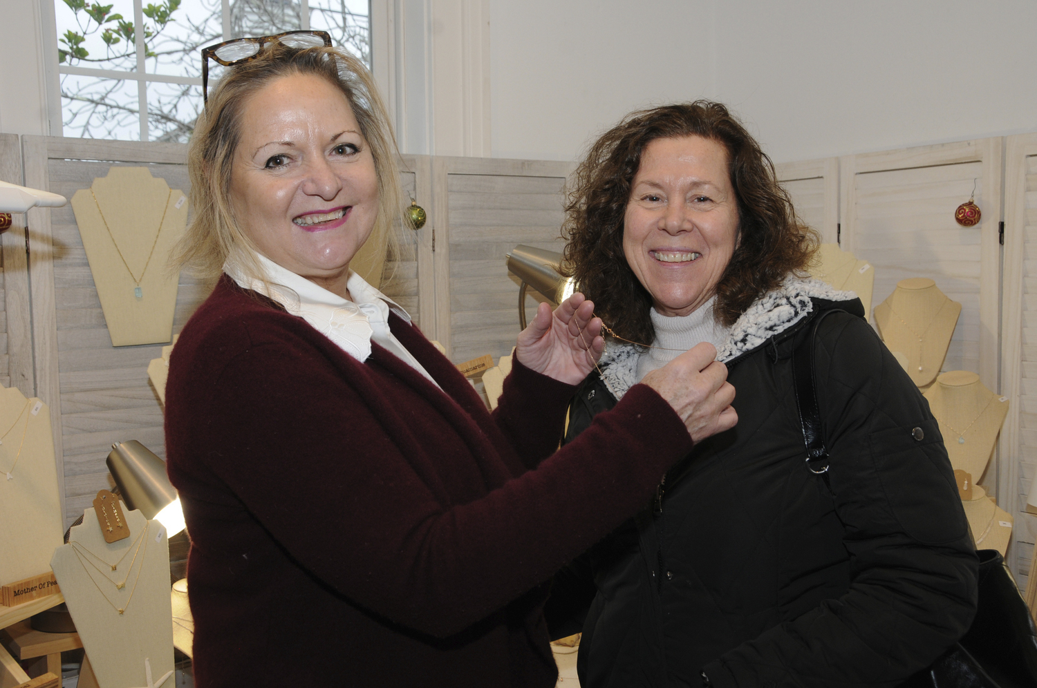 Janice Jaworski and Jeanne Carroza at the Market Artisans craft show at Ashawagh Hall on Saturday.  RICHARD LEWIN