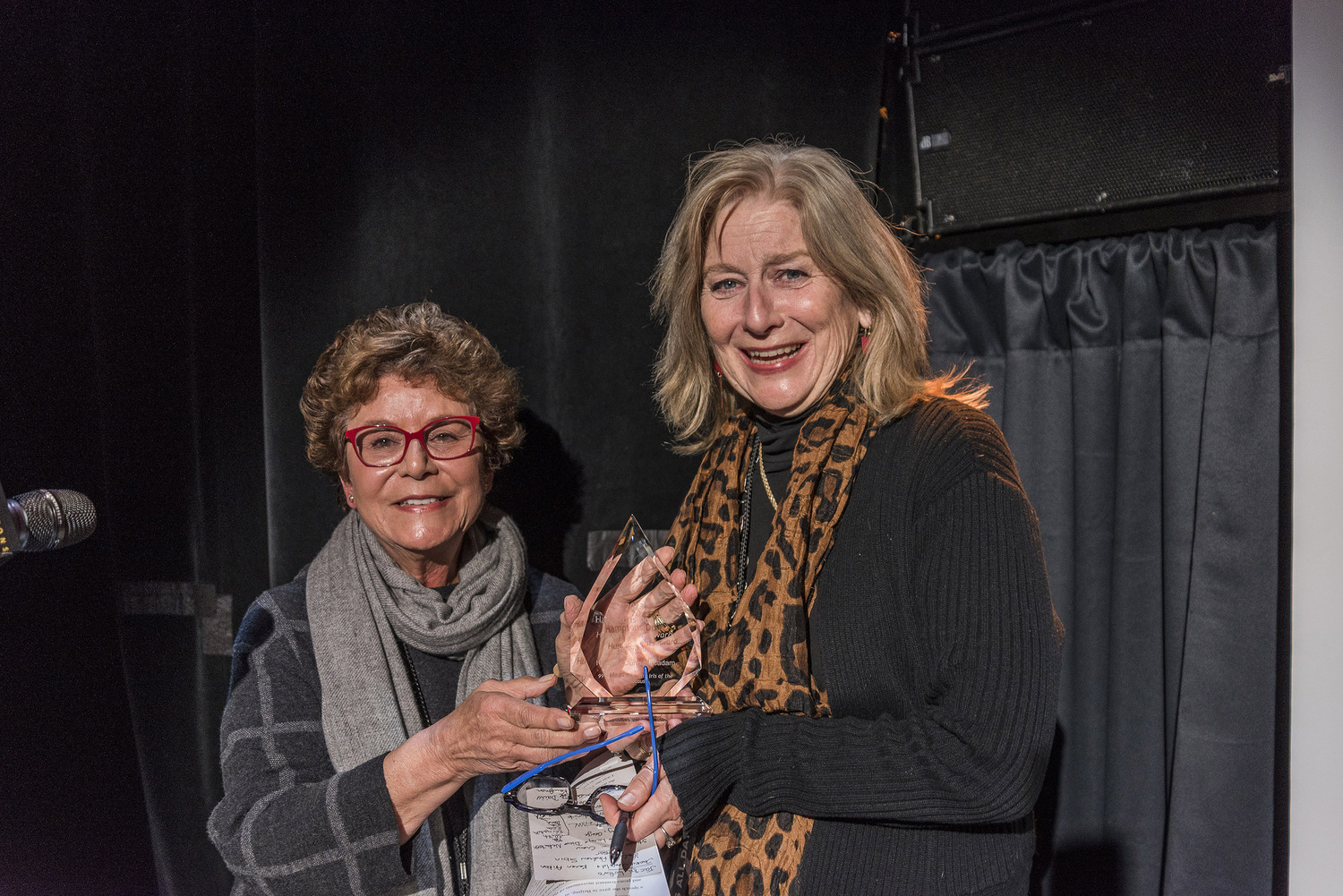 HDF director Jacqui Lofaro presented the HDF 2023 Human Rights Award to Heather Dune Macadam, author of the book and director of the film “999: The Forgotten Women of the Holocaust,” screened at Bay Street Theater on December 5. COURTESY HAMPTONS DOC FEST