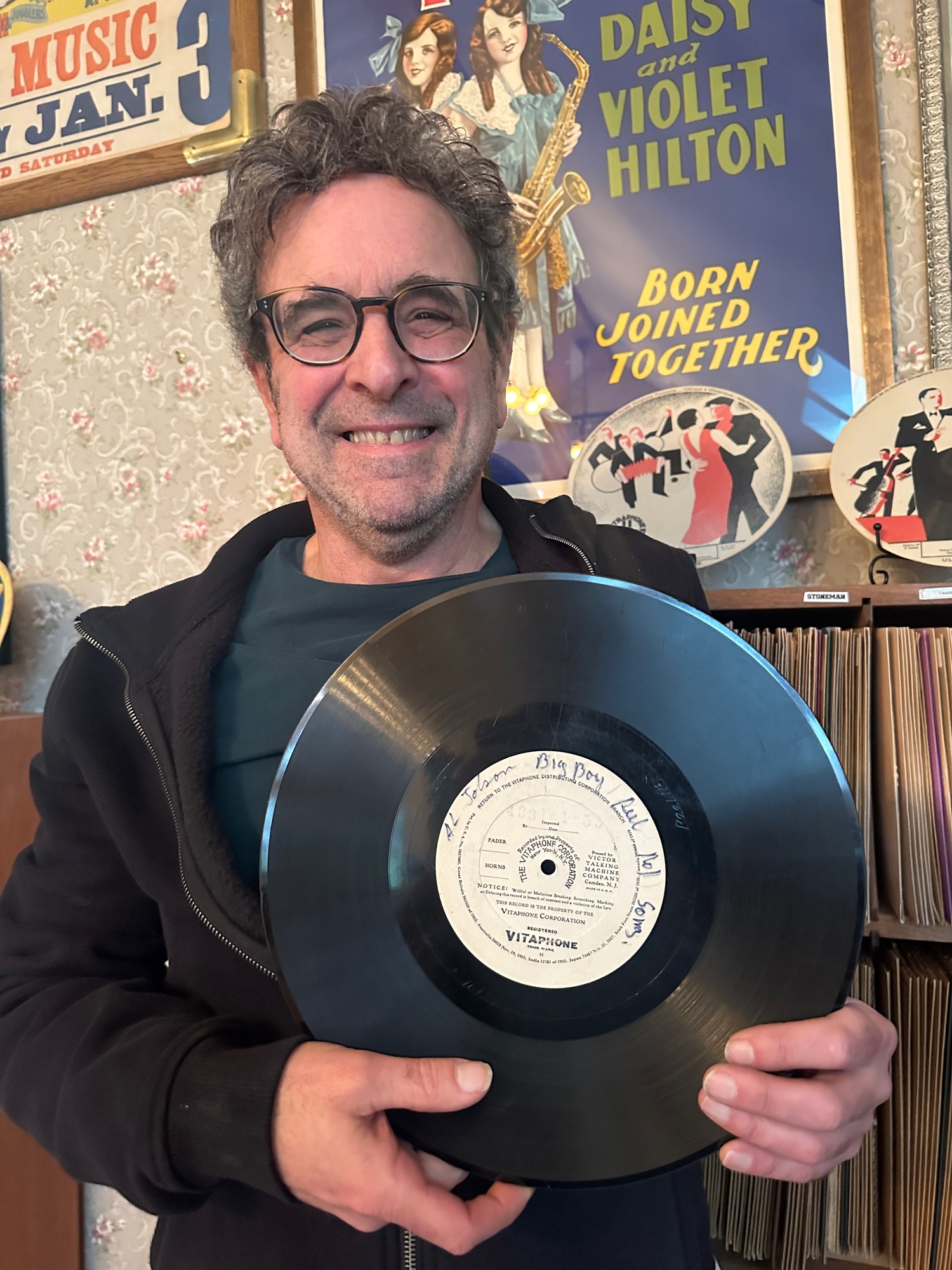 Joe Lauro in his studio with a rare Vitaphone disc recording of Al Jolson made for one of the first cinema talkies. ANNETTE HINKLE