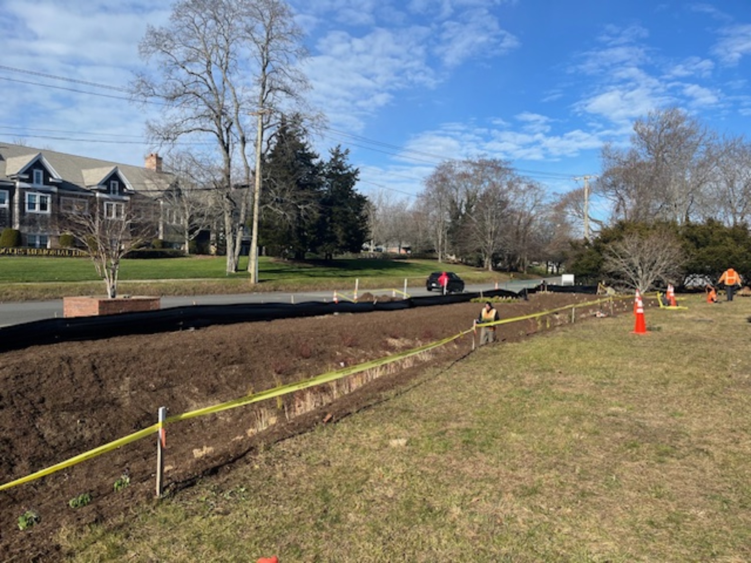 A newly installed bioswale at the corner of Windmill Lane and Nugent Street will help filter stormwater runoff and improve the health of Lake Agawam. It was installed on December 7, and paid for by more than $180,000 in grant funding from the town and county. KAREN BONTEMPO