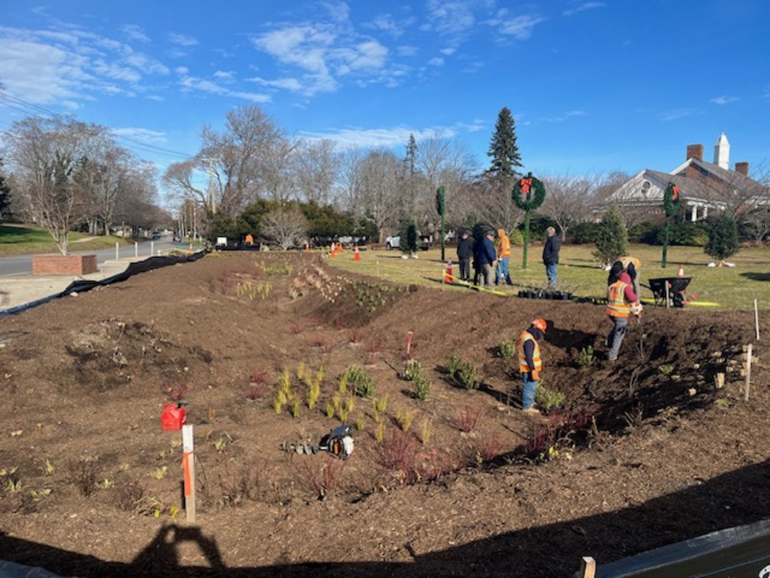 A newly installed bioswale at the corner of Windmill Lane and Nugent Street will help filter stormwater runoff and improve the health of Lake Agawam. It was installed on December 7, and paid for by more than $180,000 in grant funding from the town and county. KAREN BONTEMPO