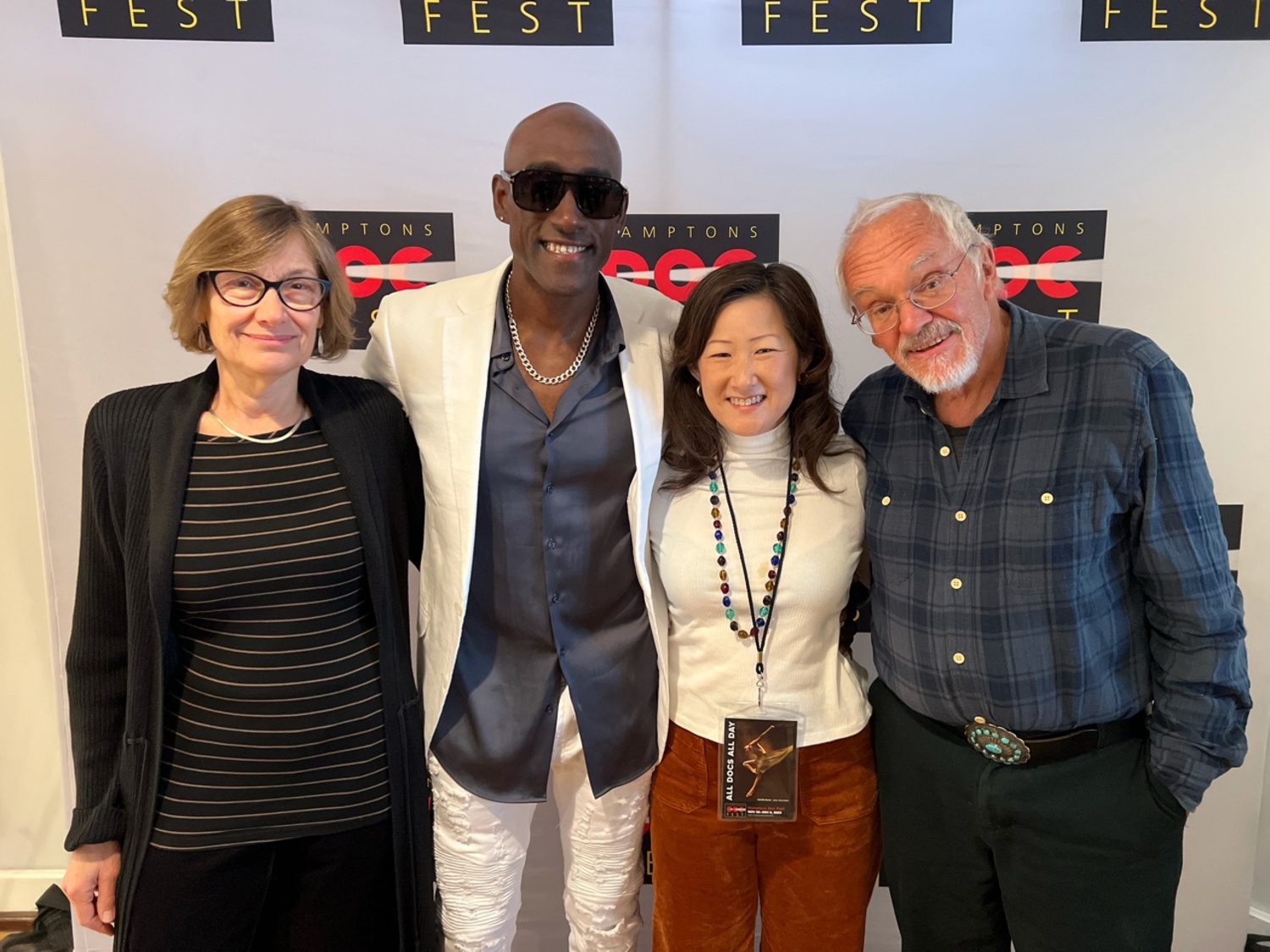 The film “26.2. to Life” was announced as the Audience Award winner at the Hamptons Doc Fest. From left, Hamptons Doc Fest associate director Jackie Leopold, film participant Markelle Taylor, “26.2 to Life” director Christine Yoo, and HDF advisory board member and Academy Award-winning filmmaker Nigel Noble of East Hampton, whose film work Yoo admires. COURTESY HAMPTONS DOC FEST