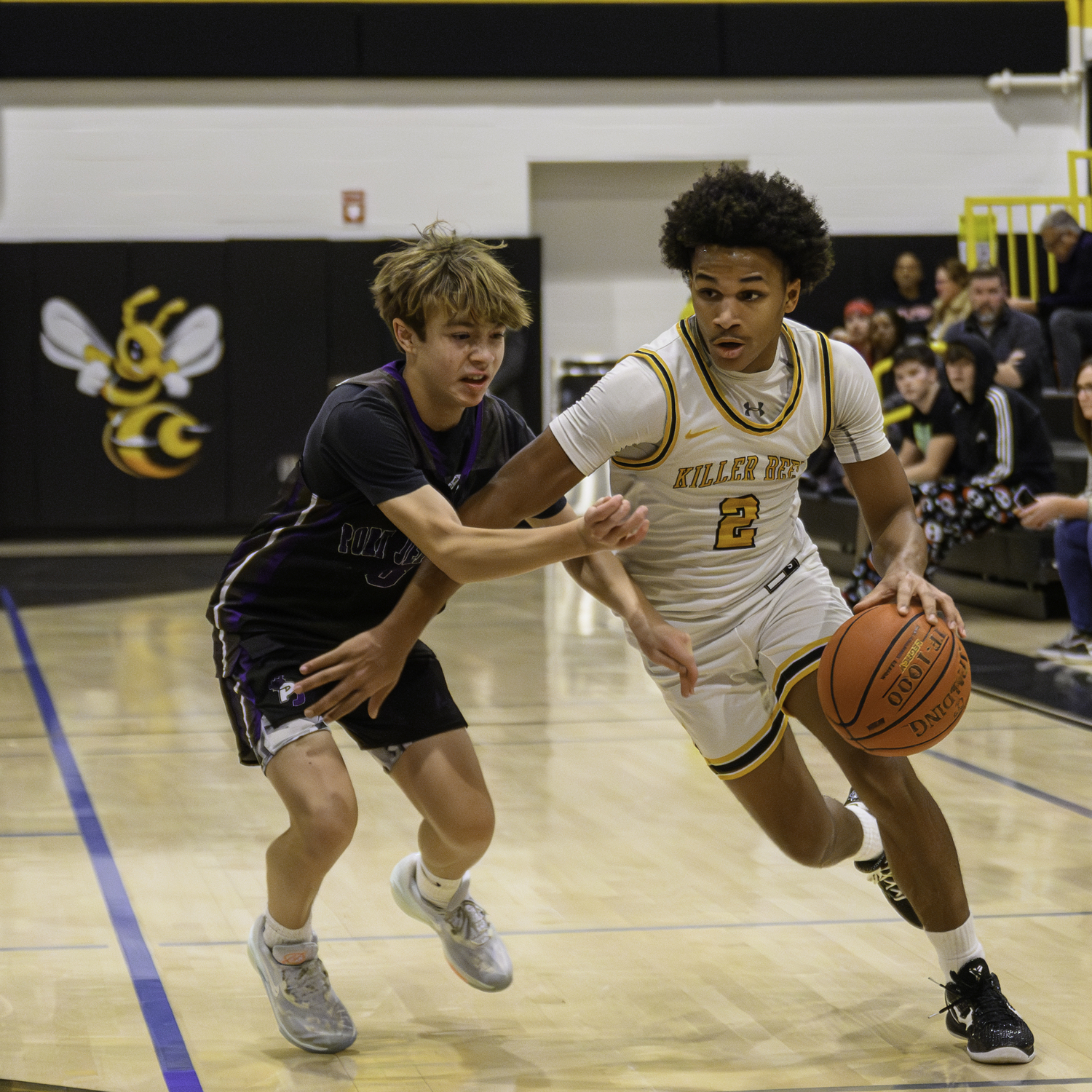 Bridgehampton sophomore Jai Feaster drives past a Port Jefferson defender.   MARIANNE BARNETT
